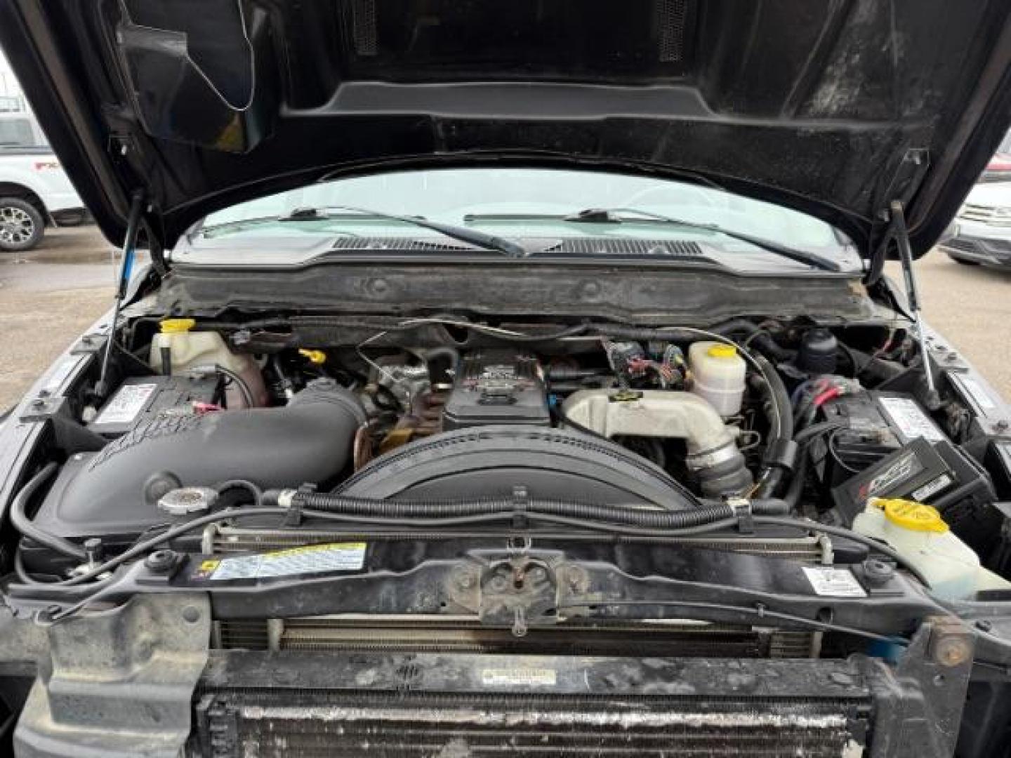 2007 BLACK /LEATHER Dodge Ram 2500 SLT Quad Cab LWB 4WD (3D7KS28C37G) with an 5.9L L6 OHV 24V TURBO DIESEL engine, 5-Speed Automatic transmission, located at 1235 N Woodruff Ave., Idaho Falls, 83401, (208) 523-1053, 43.507172, -112.000488 - At Timberline Auto, finding a great deal on your next vehicle is always easy! Our experienced sales staff's goal is to help find you the right vehicle at the right price! Our knowledgeable finance department has options for almost any credit score. We offer extended service contract options to prote - Photo#10