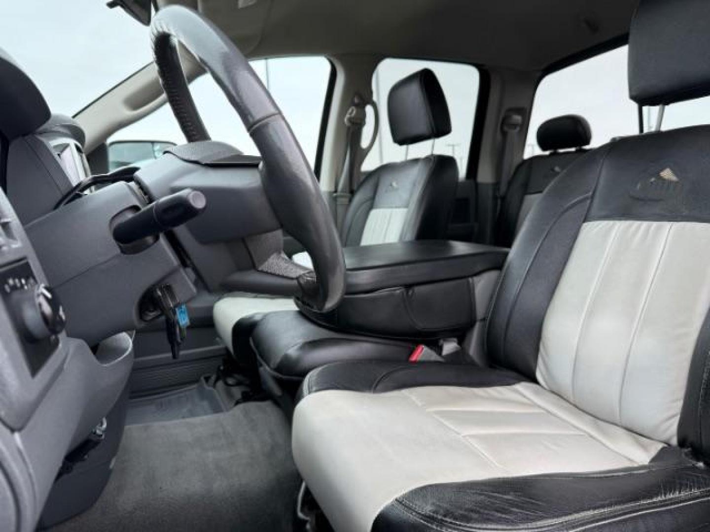 2007 BLACK /LEATHER Dodge Ram 2500 SLT Quad Cab LWB 4WD (3D7KS28C37G) with an 5.9L L6 OHV 24V TURBO DIESEL engine, 5-Speed Automatic transmission, located at 1235 N Woodruff Ave., Idaho Falls, 83401, (208) 523-1053, 43.507172, -112.000488 - At Timberline Auto, finding a great deal on your next vehicle is always easy! Our experienced sales staff's goal is to help find you the right vehicle at the right price! Our knowledgeable finance department has options for almost any credit score. We offer extended service contract options to prote - Photo#13