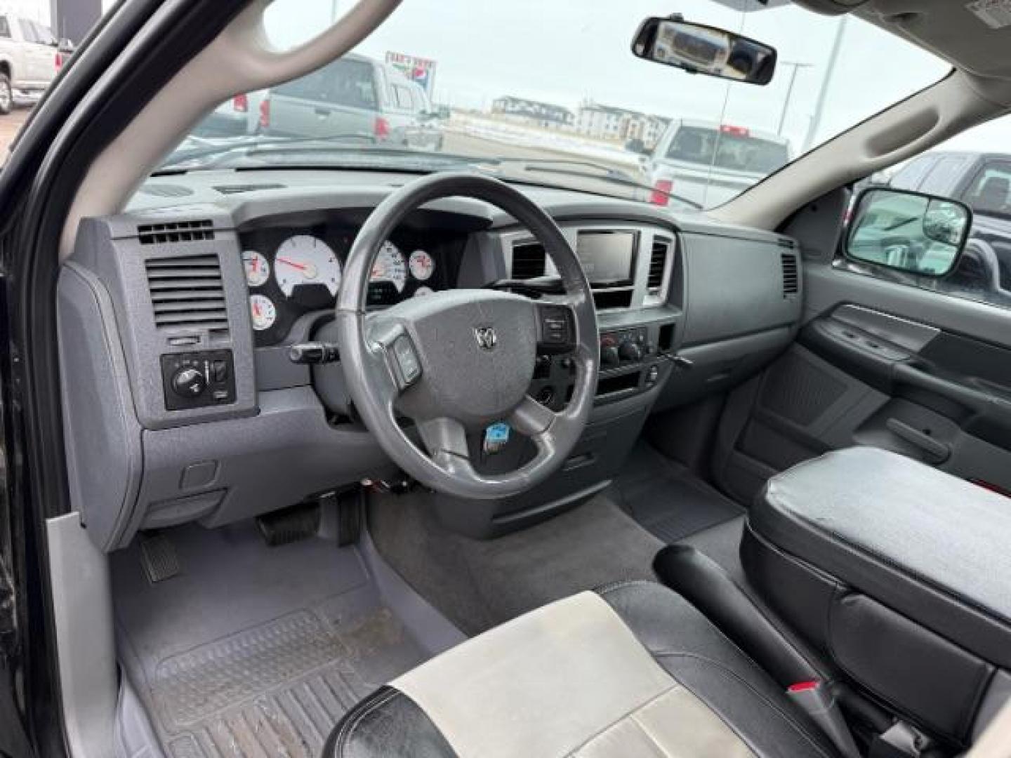 2007 BLACK /LEATHER Dodge Ram 2500 SLT Quad Cab LWB 4WD (3D7KS28C37G) with an 5.9L L6 OHV 24V TURBO DIESEL engine, 5-Speed Automatic transmission, located at 1235 N Woodruff Ave., Idaho Falls, 83401, (208) 523-1053, 43.507172, -112.000488 - At Timberline Auto, finding a great deal on your next vehicle is always easy! Our experienced sales staff's goal is to help find you the right vehicle at the right price! Our knowledgeable finance department has options for almost any credit score. We offer extended service contract options to prote - Photo#12