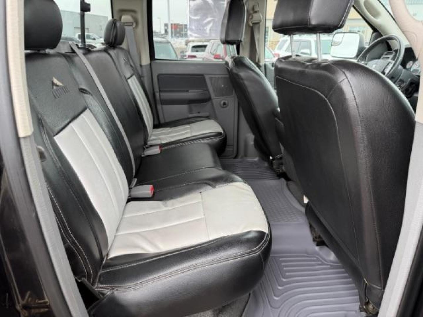 2007 BLACK /LEATHER Dodge Ram 2500 SLT Quad Cab LWB 4WD (3D7KS28C37G) with an 5.9L L6 OHV 24V TURBO DIESEL engine, 5-Speed Automatic transmission, located at 1235 N Woodruff Ave., Idaho Falls, 83401, (208) 523-1053, 43.507172, -112.000488 - At Timberline Auto, finding a great deal on your next vehicle is always easy! Our experienced sales staff's goal is to help find you the right vehicle at the right price! Our knowledgeable finance department has options for almost any credit score. We offer extended service contract options to prote - Photo#19