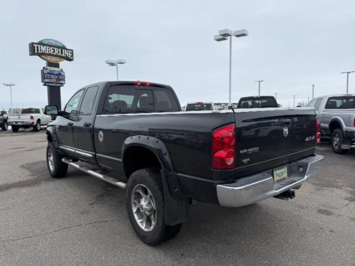 2007 BLACK /LEATHER Dodge Ram 2500 SLT Quad Cab LWB 4WD (3D7KS28C37G) with an 5.9L L6 OHV 24V TURBO DIESEL engine, 5-Speed Automatic transmission, located at 1235 N Woodruff Ave., Idaho Falls, 83401, (208) 523-1053, 43.507172, -112.000488 - At Timberline Auto, finding a great deal on your next vehicle is always easy! Our experienced sales staff's goal is to help find you the right vehicle at the right price! Our knowledgeable finance department has options for almost any credit score. We offer extended service contract options to prote - Photo#2