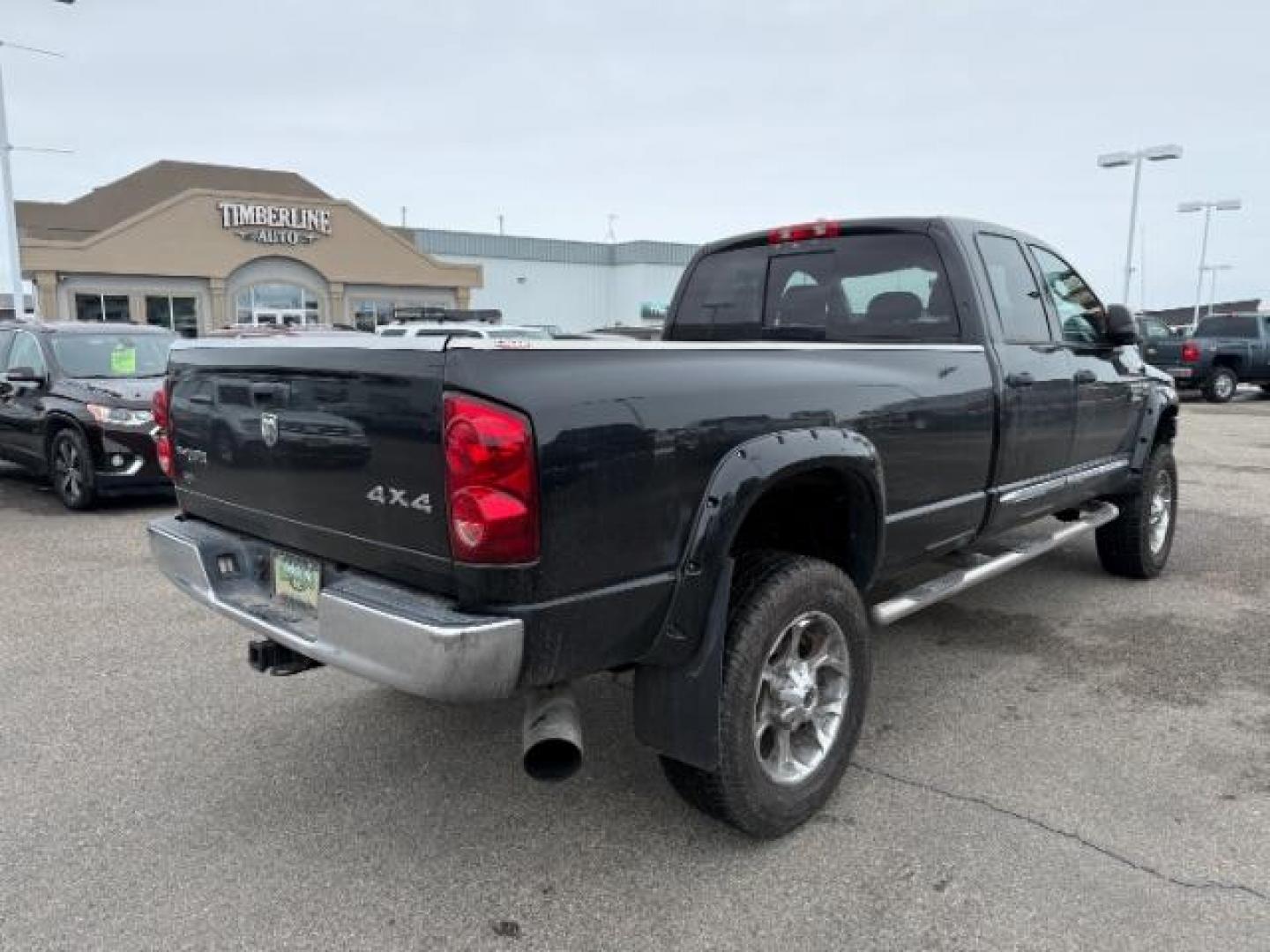 2007 BLACK /LEATHER Dodge Ram 2500 SLT Quad Cab LWB 4WD (3D7KS28C37G) with an 5.9L L6 OHV 24V TURBO DIESEL engine, 5-Speed Automatic transmission, located at 1235 N Woodruff Ave., Idaho Falls, 83401, (208) 523-1053, 43.507172, -112.000488 - At Timberline Auto, finding a great deal on your next vehicle is always easy! Our experienced sales staff's goal is to help find you the right vehicle at the right price! Our knowledgeable finance department has options for almost any credit score. We offer extended service contract options to prote - Photo#4