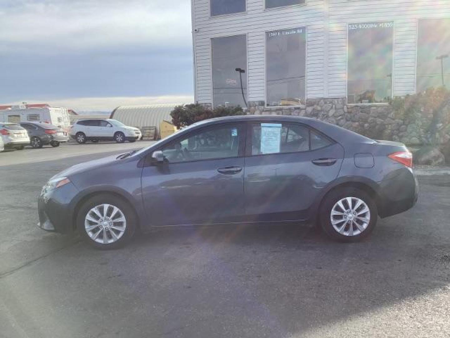2016 Slate Metallic Toyota Corolla LE CVT (2T1BURHE7GC) with an 1.8L L4 DOHC 16V engine, Continuously Variable Transmission transmission, located at 1235 N Woodruff Ave., Idaho Falls, 83401, (208) 523-1053, 43.507172, -112.000488 - Photo#2