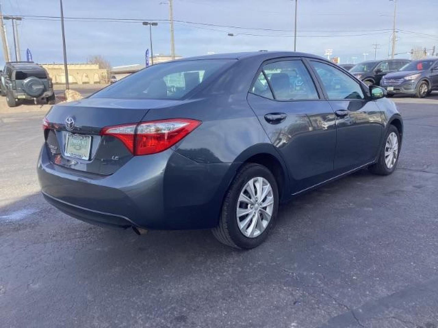 2016 Slate Metallic Toyota Corolla LE CVT (2T1BURHE7GC) with an 1.8L L4 DOHC 16V engine, Continuously Variable Transmission transmission, located at 1235 N Woodruff Ave., Idaho Falls, 83401, (208) 523-1053, 43.507172, -112.000488 - Photo#5