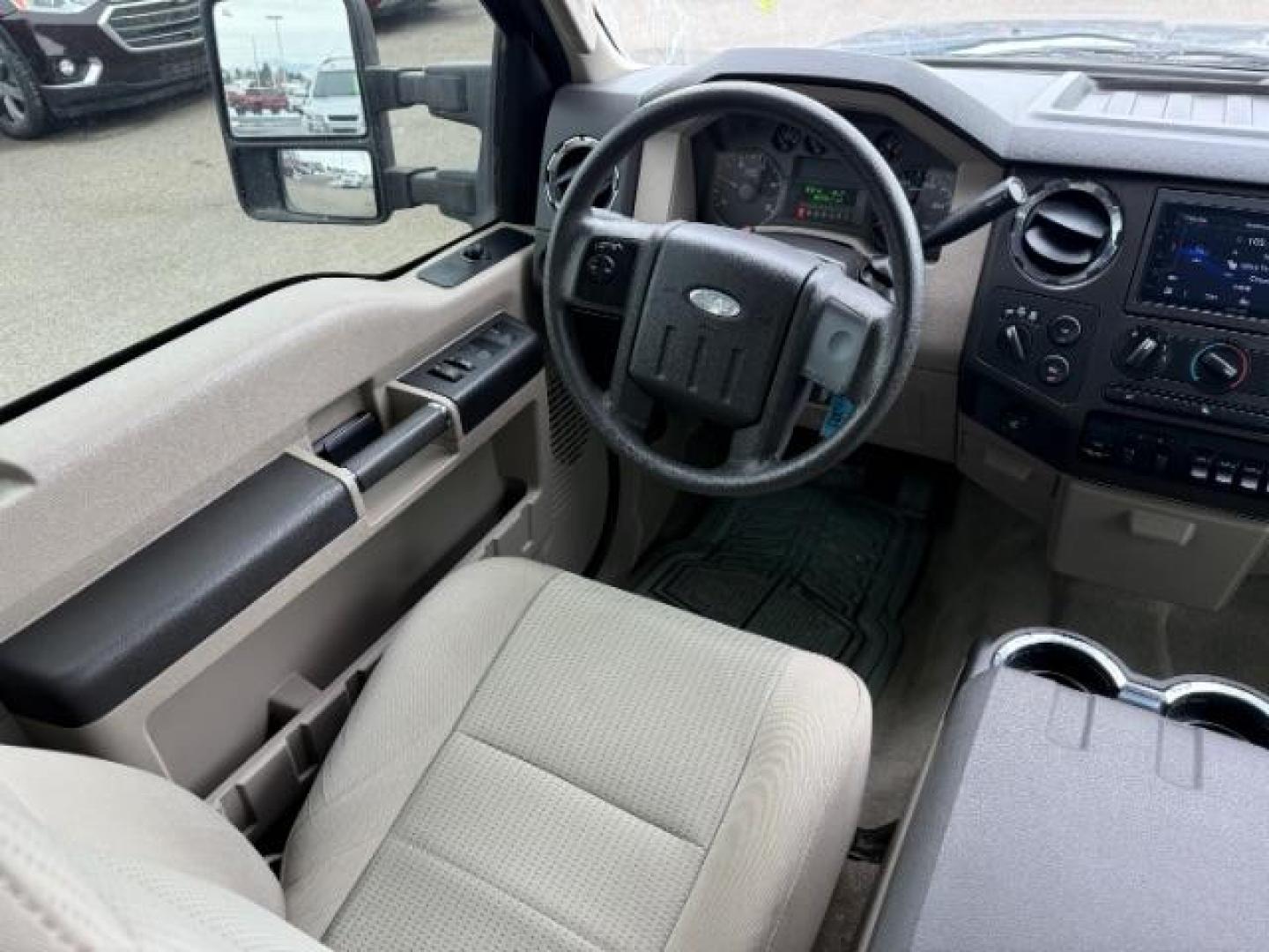 2008 GRAY /Medium Stone Cloth Interior Ford F-350 SD XLT Crew Cab 4WD (1FTWW31R48E) with an 6.4L V8 OHV 32V TURBO DIESEL engine, 5-Speed Automatic transmission, located at 1235 N Woodruff Ave., Idaho Falls, 83401, (208) 523-1053, 43.507172, -112.000488 - At Timberline Auto, finding a great deal on your next vehicle is always easy! Our experienced sales staff's goal is to help find you the right vehicle at the right price! Our knowledgeable finance department has options for almost any credit score. We offer extended service contract options to prote - Photo#19