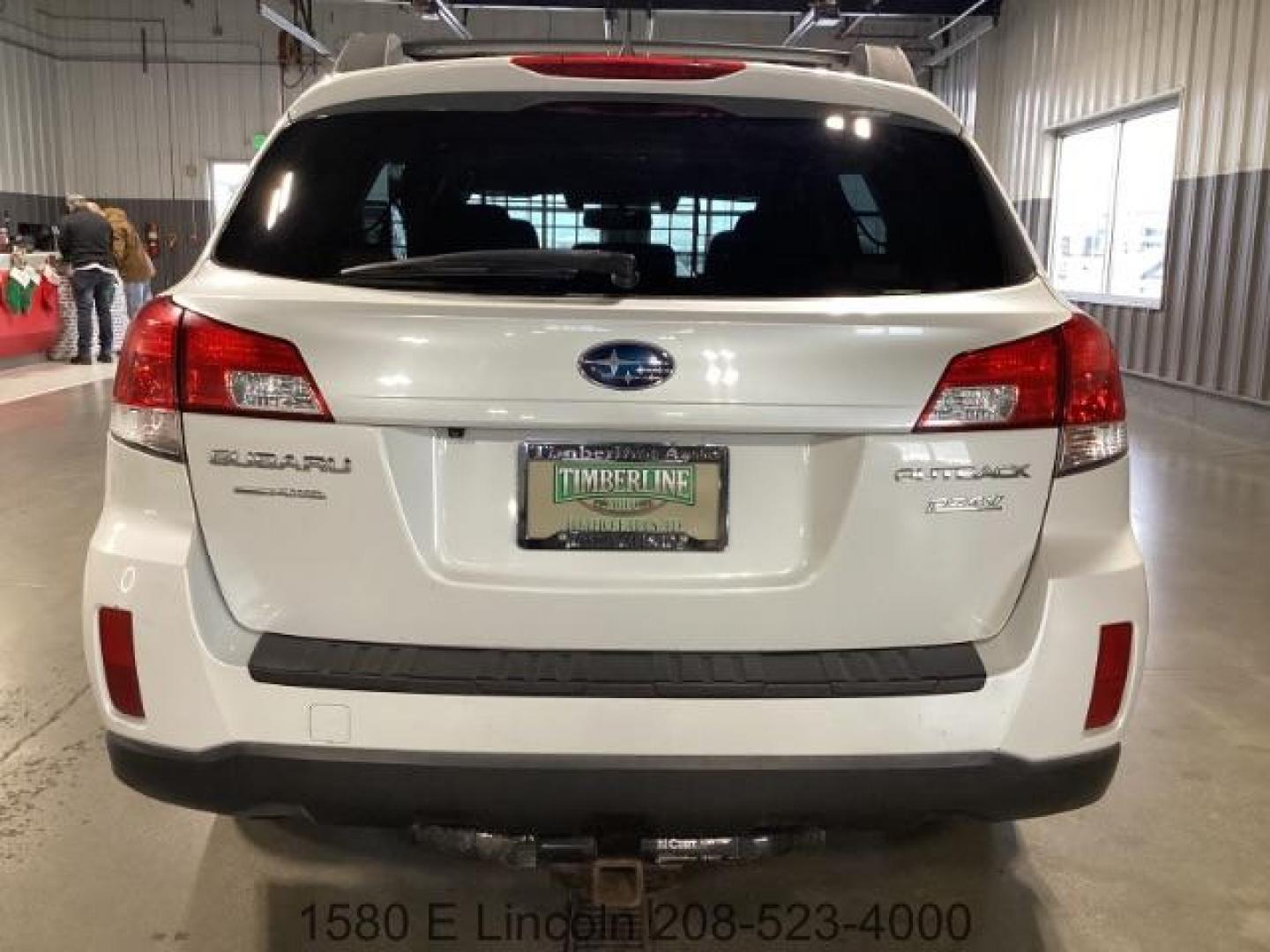 2014 Satin White Pearl Subaru Outback 2.5i Limited (4S4BRBPC1E3) with an 2.5L H4 DOHC 16V engine, located at 1235 N Woodruff Ave., Idaho Falls, 83401, (208) 523-1053, 43.507172, -112.000488 - Photo#2