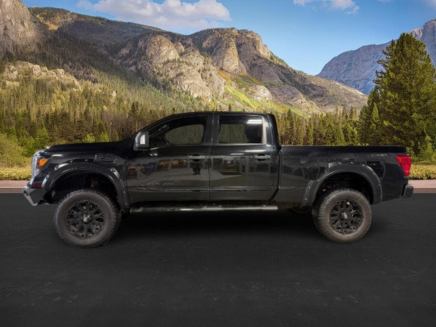 2018 BLACK /Black, leather Nissan Titan XD SL Midnight Edition 4x4 (1N6BA1F4XJN) with an 5.0L V8 DOHC 32V DIESEL engine, 6-Speed Automatic transmission, located at 1235 N Woodruff Ave., Idaho Falls, 83401, (208) 523-1053, 43.507172, -112.000488 - At Timberline Auto, finding a great deal on your next vehicle is always easy! Our experienced sales staff's goal is to help find you the right vehicle at the right price! Our knowledgeable finance department has options for almost any credit score. We offer extended service contract options to prote - Photo#1