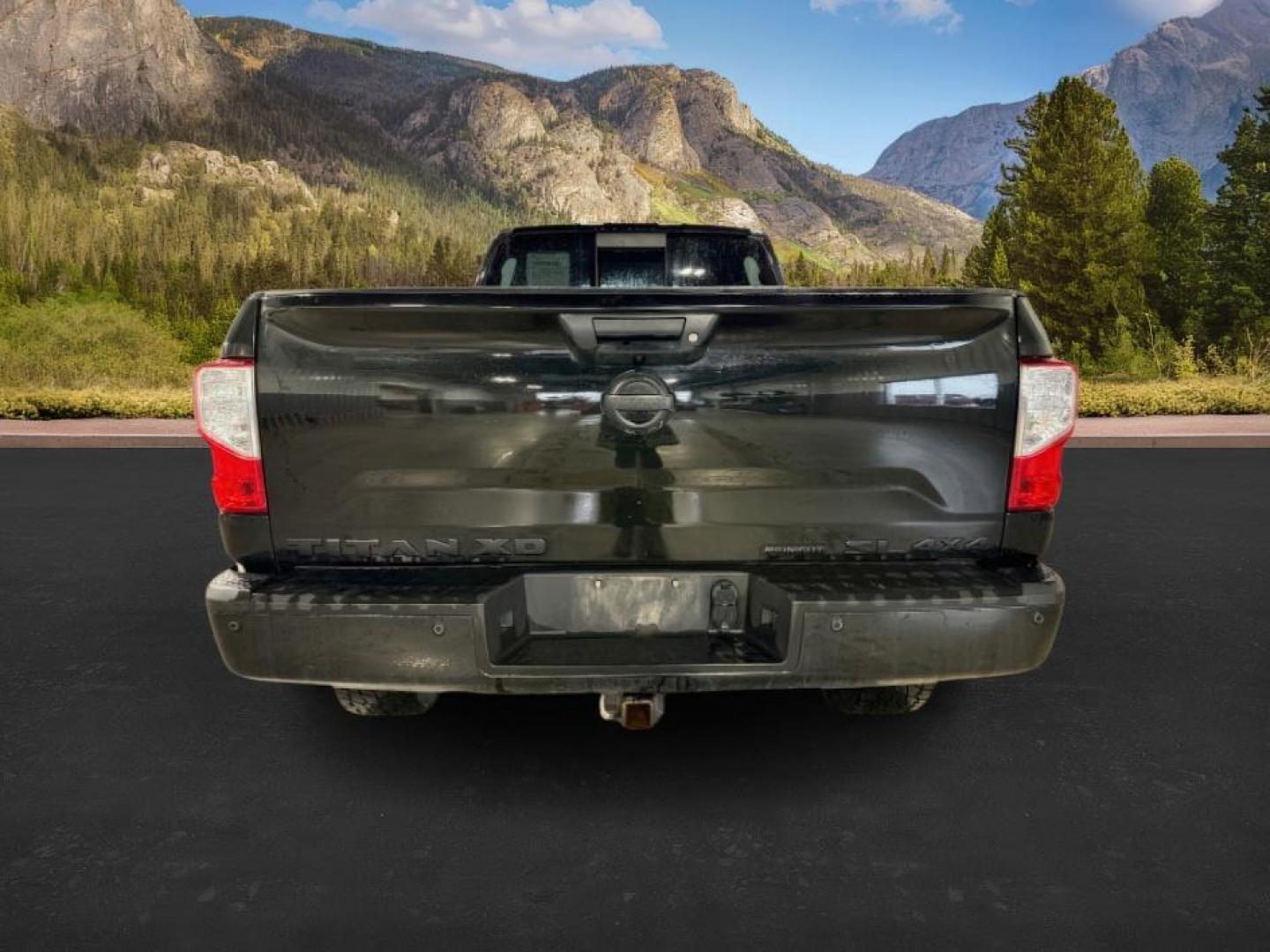 2018 BLACK /Black, leather Nissan Titan XD SL Midnight Edition 4x4 (1N6BA1F4XJN) with an 5.0L V8 DOHC 32V DIESEL engine, 6-Speed Automatic transmission, located at 1235 N Woodruff Ave., Idaho Falls, 83401, (208) 523-1053, 43.507172, -112.000488 - At Timberline Auto, finding a great deal on your next vehicle is always easy! Our experienced sales staff's goal is to help find you the right vehicle at the right price! Our knowledgeable finance department has options for almost any credit score. We offer extended service contract options to prote - Photo#2