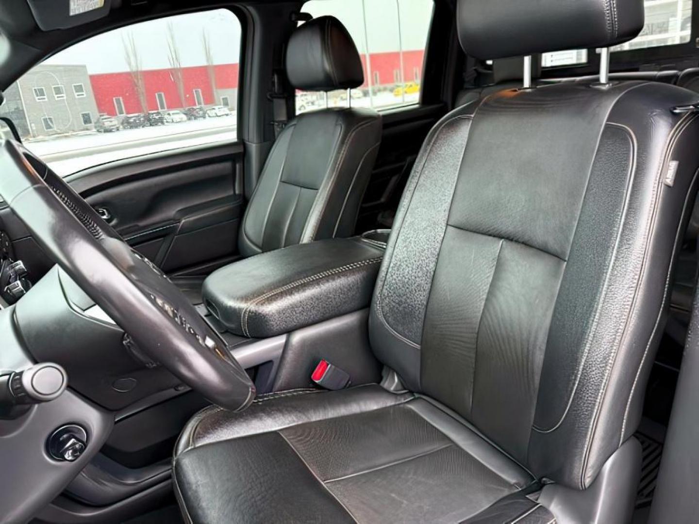2018 BLACK /Black, leather Nissan Titan XD SL Midnight Edition 4x4 (1N6BA1F4XJN) with an 5.0L V8 DOHC 32V DIESEL engine, 6-Speed Automatic transmission, located at 1235 N Woodruff Ave., Idaho Falls, 83401, (208) 523-1053, 43.507172, -112.000488 - At Timberline Auto, finding a great deal on your next vehicle is always easy! Our experienced sales staff's goal is to help find you the right vehicle at the right price! Our knowledgeable finance department has options for almost any credit score. We offer extended service contract options to prote - Photo#10