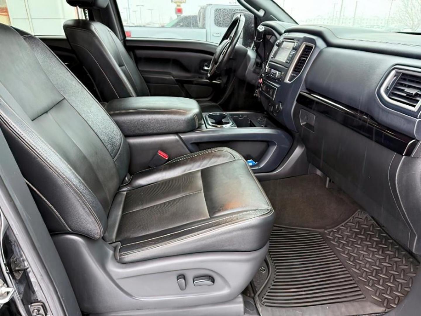 2018 BLACK /Black, leather Nissan Titan XD SL Midnight Edition 4x4 (1N6BA1F4XJN) with an 5.0L V8 DOHC 32V DIESEL engine, 6-Speed Automatic transmission, located at 1235 N Woodruff Ave., Idaho Falls, 83401, (208) 523-1053, 43.507172, -112.000488 - At Timberline Auto, finding a great deal on your next vehicle is always easy! Our experienced sales staff's goal is to help find you the right vehicle at the right price! Our knowledgeable finance department has options for almost any credit score. We offer extended service contract options to prote - Photo#11