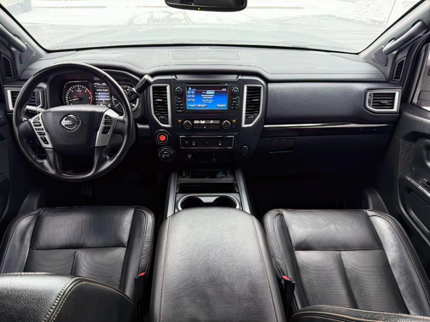 2018 BLACK /Black, leather Nissan Titan XD SL Midnight Edition 4x4 (1N6BA1F4XJN) with an 5.0L V8 DOHC 32V DIESEL engine, 6-Speed Automatic transmission, located at 1235 N Woodruff Ave., Idaho Falls, 83401, (208) 523-1053, 43.507172, -112.000488 - At Timberline Auto, finding a great deal on your next vehicle is always easy! Our experienced sales staff's goal is to help find you the right vehicle at the right price! Our knowledgeable finance department has options for almost any credit score. We offer extended service contract options to prote - Photo#13