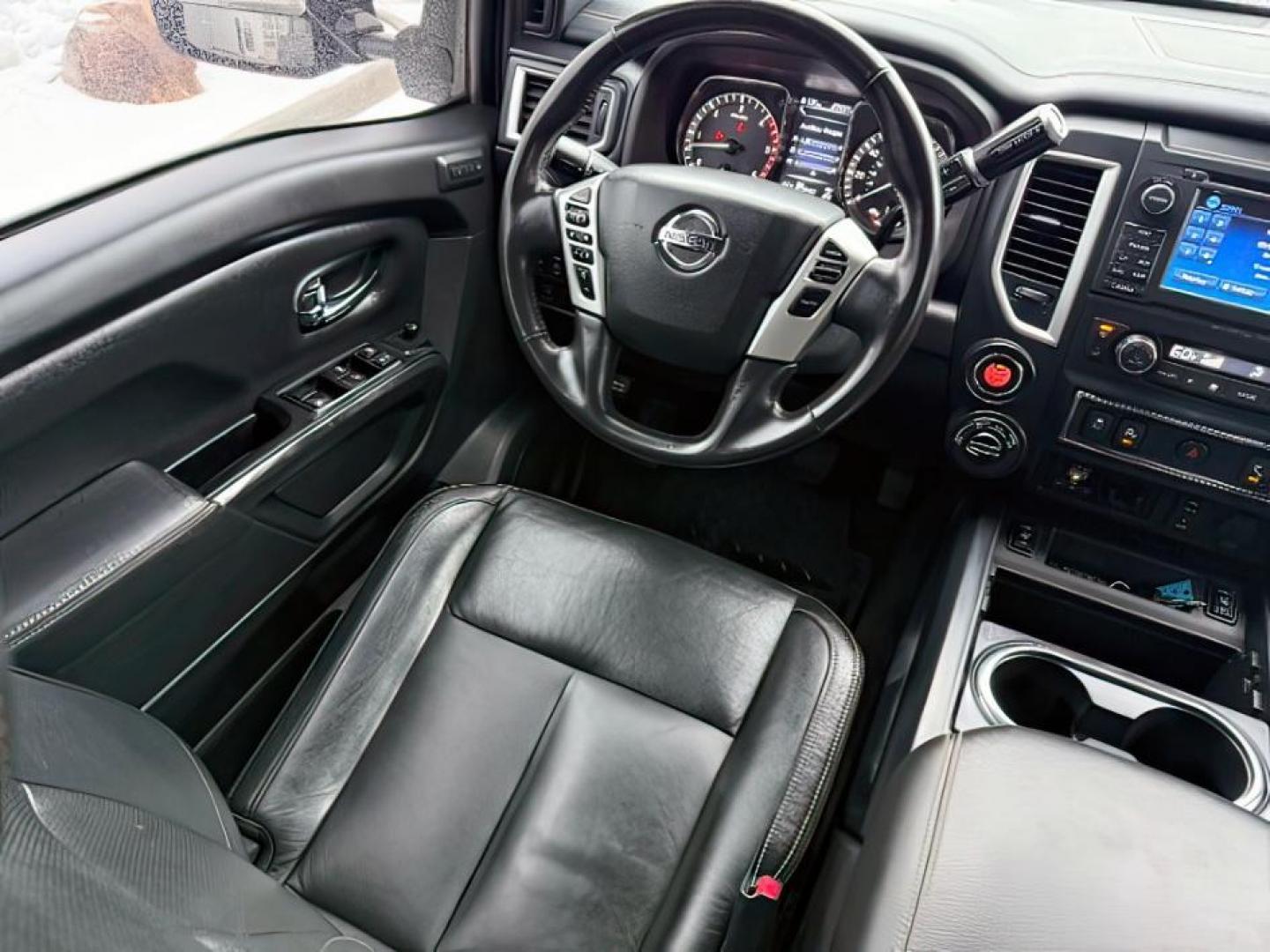 2018 BLACK /Black, leather Nissan Titan XD SL Midnight Edition 4x4 (1N6BA1F4XJN) with an 5.0L V8 DOHC 32V DIESEL engine, 6-Speed Automatic transmission, located at 1235 N Woodruff Ave., Idaho Falls, 83401, (208) 523-1053, 43.507172, -112.000488 - At Timberline Auto, finding a great deal on your next vehicle is always easy! Our experienced sales staff's goal is to help find you the right vehicle at the right price! Our knowledgeable finance department has options for almost any credit score. We offer extended service contract options to prote - Photo#14