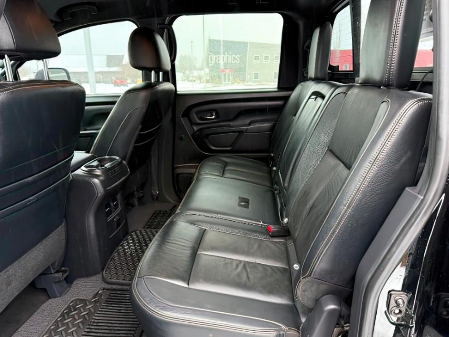 2018 BLACK /Black, leather Nissan Titan XD SL Midnight Edition 4x4 (1N6BA1F4XJN) with an 5.0L V8 DOHC 32V DIESEL engine, 6-Speed Automatic transmission, located at 1235 N Woodruff Ave., Idaho Falls, 83401, (208) 523-1053, 43.507172, -112.000488 - At Timberline Auto, finding a great deal on your next vehicle is always easy! Our experienced sales staff's goal is to help find you the right vehicle at the right price! Our knowledgeable finance department has options for almost any credit score. We offer extended service contract options to prote - Photo#23