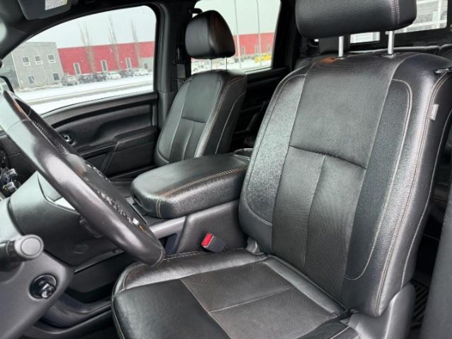 2018 BLACK /Black, leather Nissan Titan XD SL Midnight Edition 4x4 (1N6BA1F4XJN) with an 5.0L V8 DOHC 32V DIESEL engine, 6-Speed Automatic transmission, located at 1235 N Woodruff Ave., Idaho Falls, 83401, (208) 523-1053, 43.507172, -112.000488 - At Timberline Auto, finding a great deal on your next vehicle is always easy! Our experienced sales staff's goal is to help find you the right vehicle at the right price! Our knowledgeable finance department has options for almost any credit score. We offer extended service contract options to prote - Photo#10