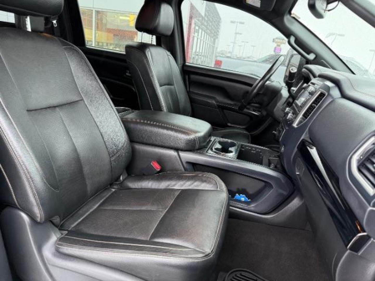 2018 BLACK /Black, leather Nissan Titan XD SL Midnight Edition 4x4 (1N6BA1F4XJN) with an 5.0L V8 DOHC 32V DIESEL engine, 6-Speed Automatic transmission, located at 1235 N Woodruff Ave., Idaho Falls, 83401, (208) 523-1053, 43.507172, -112.000488 - At Timberline Auto, finding a great deal on your next vehicle is always easy! Our experienced sales staff's goal is to help find you the right vehicle at the right price! Our knowledgeable finance department has options for almost any credit score. We offer extended service contract options to prote - Photo#12