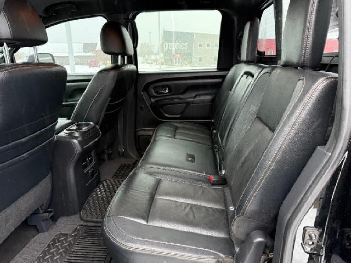 2018 BLACK /Black, leather Nissan Titan XD SL Midnight Edition 4x4 (1N6BA1F4XJN) with an 5.0L V8 DOHC 32V DIESEL engine, 6-Speed Automatic transmission, located at 1235 N Woodruff Ave., Idaho Falls, 83401, (208) 523-1053, 43.507172, -112.000488 - At Timberline Auto, finding a great deal on your next vehicle is always easy! Our experienced sales staff's goal is to help find you the right vehicle at the right price! Our knowledgeable finance department has options for almost any credit score. We offer extended service contract options to prote - Photo#23