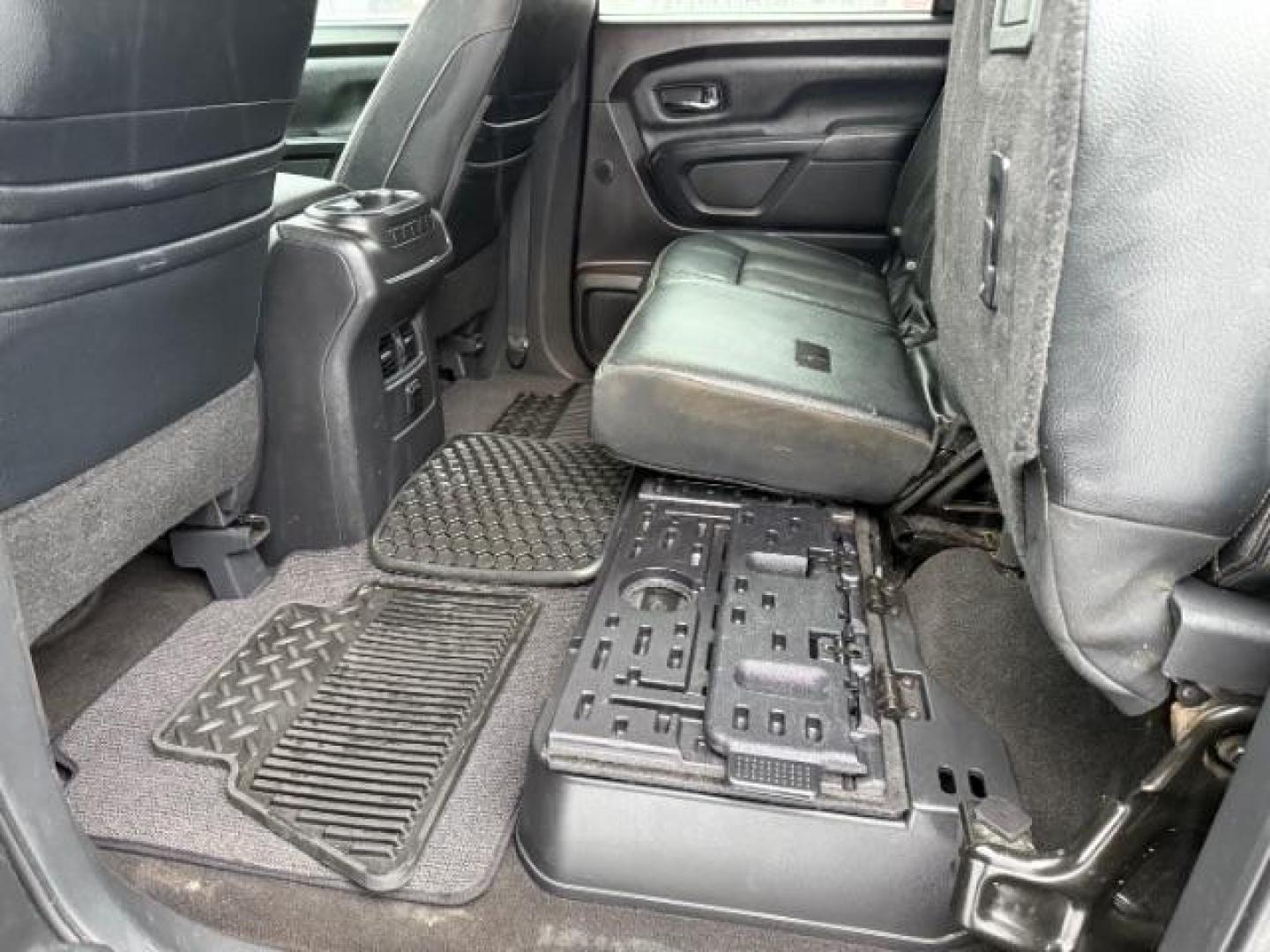 2018 BLACK /Black, leather Nissan Titan XD SL Midnight Edition 4x4 (1N6BA1F4XJN) with an 5.0L V8 DOHC 32V DIESEL engine, 6-Speed Automatic transmission, located at 1235 N Woodruff Ave., Idaho Falls, 83401, (208) 523-1053, 43.507172, -112.000488 - At Timberline Auto, finding a great deal on your next vehicle is always easy! Our experienced sales staff's goal is to help find you the right vehicle at the right price! Our knowledgeable finance department has options for almost any credit score. We offer extended service contract options to prote - Photo#24