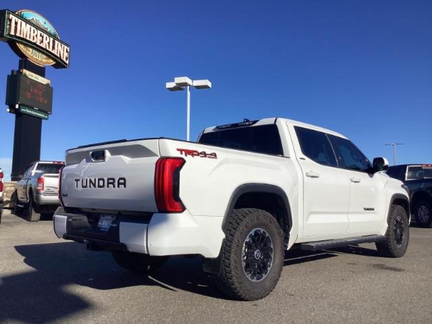 2022 White /Black Toyota Tundra SR5 CrewMax 4WD (5TFLA5DB3NX) with an 3.4L V6 DOHC 24V engine, 6-Speed Automatic transmission, located at 1235 N Woodruff Ave., Idaho Falls, 83401, (208) 523-1053, 43.507172, -112.000488 - At Timberline Auto, finding a great deal on your next vehicle is always easy! Our experienced sales staff's goal is to help find you the right vehicle at the right price! Our knowledgeable finance department has options for almost any credit score. We offer extended service contract options to prote - Photo#5