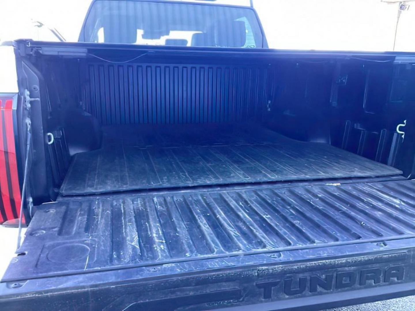 2022 White /Black Toyota Tundra (5TFLA5DB3NX) with an 34L V6 DOHC 24V engine, Automatic transmission, located at 1175 N Woodruff Ave, Idaho Falls, ID, 83401, 43.506901, -111.999657 - At Timberline Auto, finding a great deal on your next vehicle is always easy! Our experienced sales staff's goal is to help find you the right vehicle at the right price! Our knowledgeable finance department has options for almost any credit score. We offer extended service contract options to prote - Photo#9
