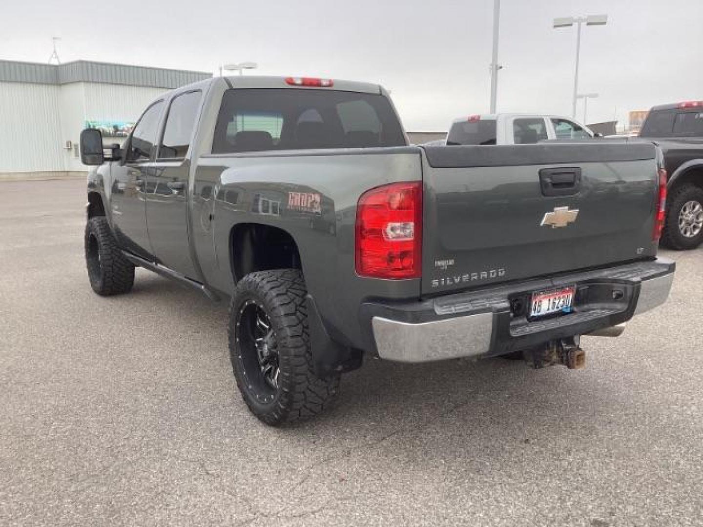 2011 Taupe Gray Metallic /Ebony Leather Interior Chevrolet Silverado 3500HD LT Crew Cab 4WD (1GC4K0C81BF) with an 6.6L V8 OHV 32V TURBO DIESEL engine, 6-Speed Automatic transmission, located at 1235 N Woodruff Ave., Idaho Falls, 83401, (208) 523-1053, 43.507172, -112.000488 - Photo#3