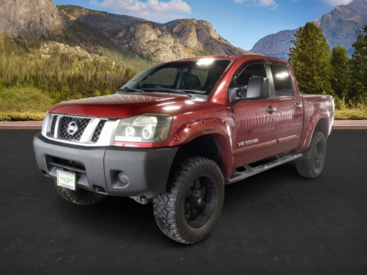 2014 Venetian Ruby /Charcoal II Nissan Titan PRO-4X Crew Cab 4WD SWB (1N6AA0ECXEN) with an 5.6L V8 DOHC 32V engine, 5-Speed Automatic transmission, located at 1235 N Woodruff Ave., Idaho Falls, 83401, (208) 523-1053, 43.507172, -112.000488 - At Timberline Auto, finding a great deal on your next vehicle is always easy! Our experienced sales staff's goal is to help find you the right vehicle at the right price! Our knowledgeable finance department has options for almost any credit score. We offer extended service contract options to prote - Photo#0