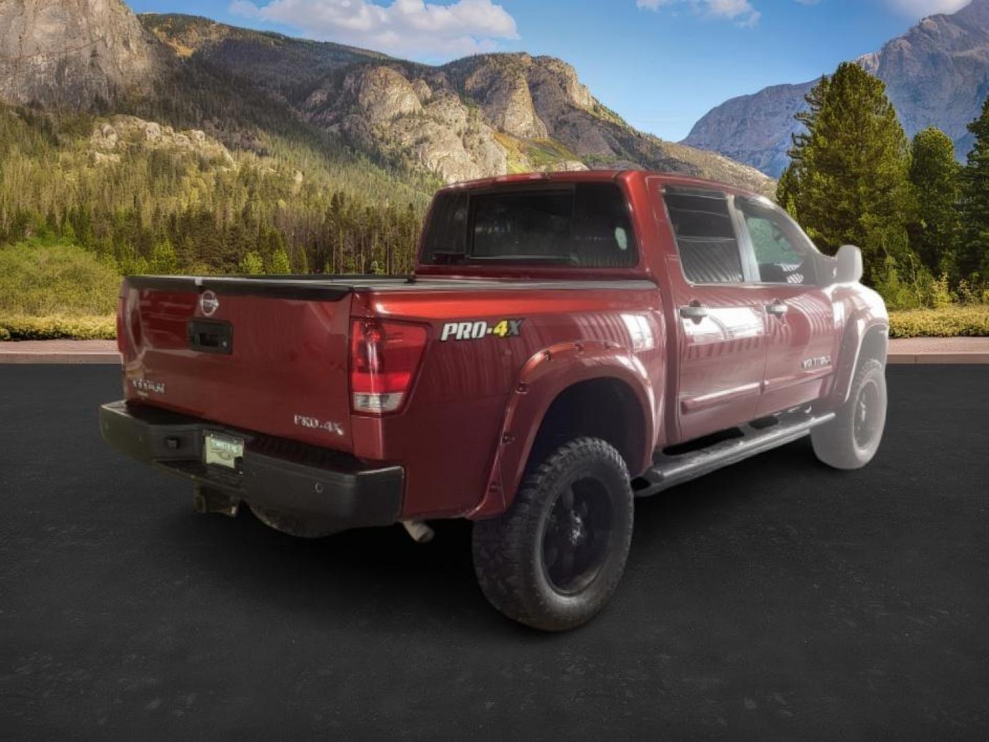 2014 Venetian Ruby /Charcoal II Nissan Titan PRO-4X Crew Cab 4WD SWB (1N6AA0ECXEN) with an 5.6L V8 DOHC 32V engine, 5-Speed Automatic transmission, located at 1235 N Woodruff Ave., Idaho Falls, 83401, (208) 523-1053, 43.507172, -112.000488 - At Timberline Auto, finding a great deal on your next vehicle is always easy! Our experienced sales staff's goal is to help find you the right vehicle at the right price! Our knowledgeable finance department has options for almost any credit score. We offer extended service contract options to prote - Photo#4