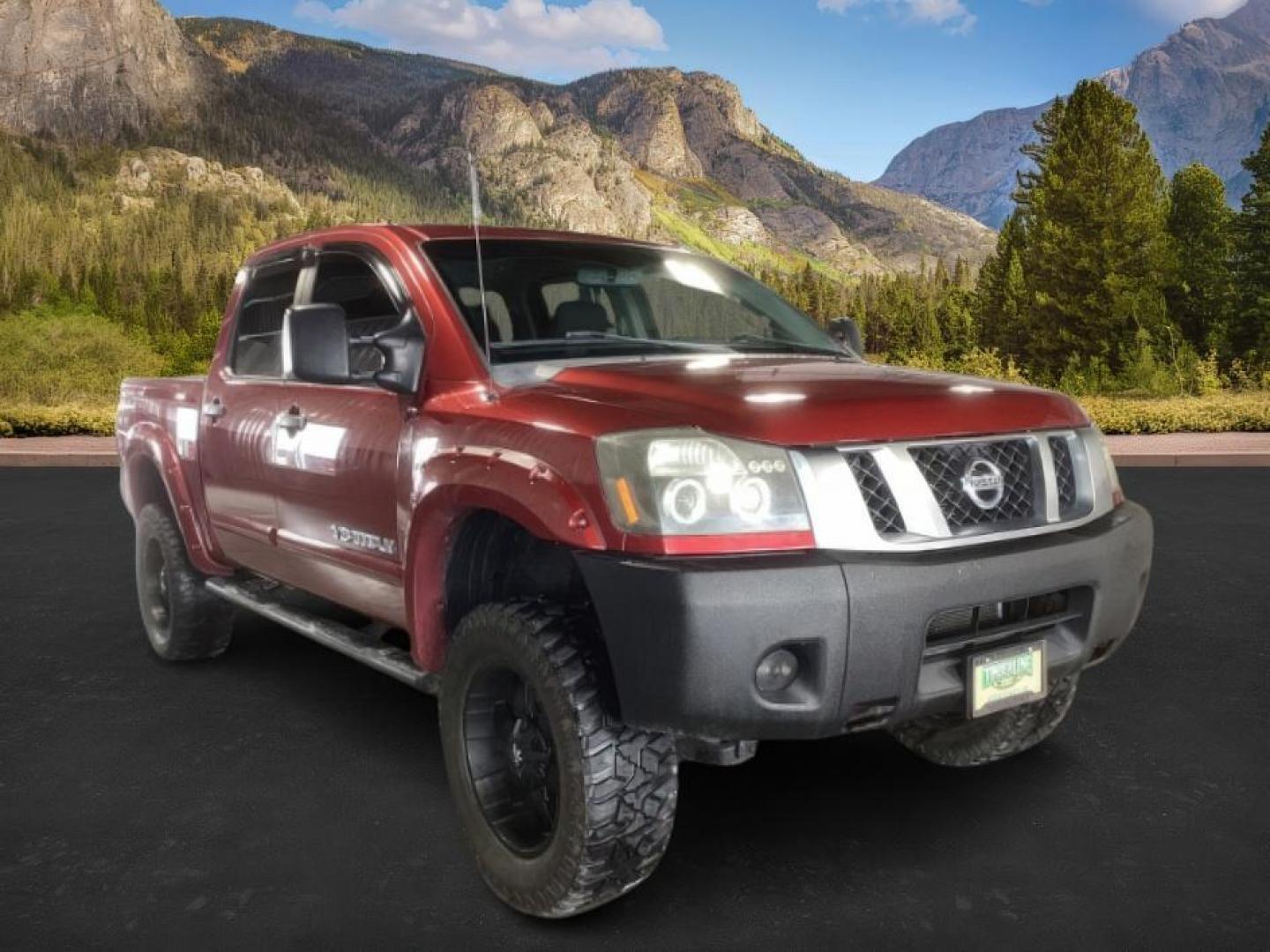 2014 Venetian Ruby /Charcoal II Nissan Titan PRO-4X Crew Cab 4WD SWB (1N6AA0ECXEN) with an 5.6L V8 DOHC 32V engine, 5-Speed Automatic transmission, located at 1235 N Woodruff Ave., Idaho Falls, 83401, (208) 523-1053, 43.507172, -112.000488 - At Timberline Auto, finding a great deal on your next vehicle is always easy! Our experienced sales staff's goal is to help find you the right vehicle at the right price! Our knowledgeable finance department has options for almost any credit score. We offer extended service contract options to prote - Photo#5
