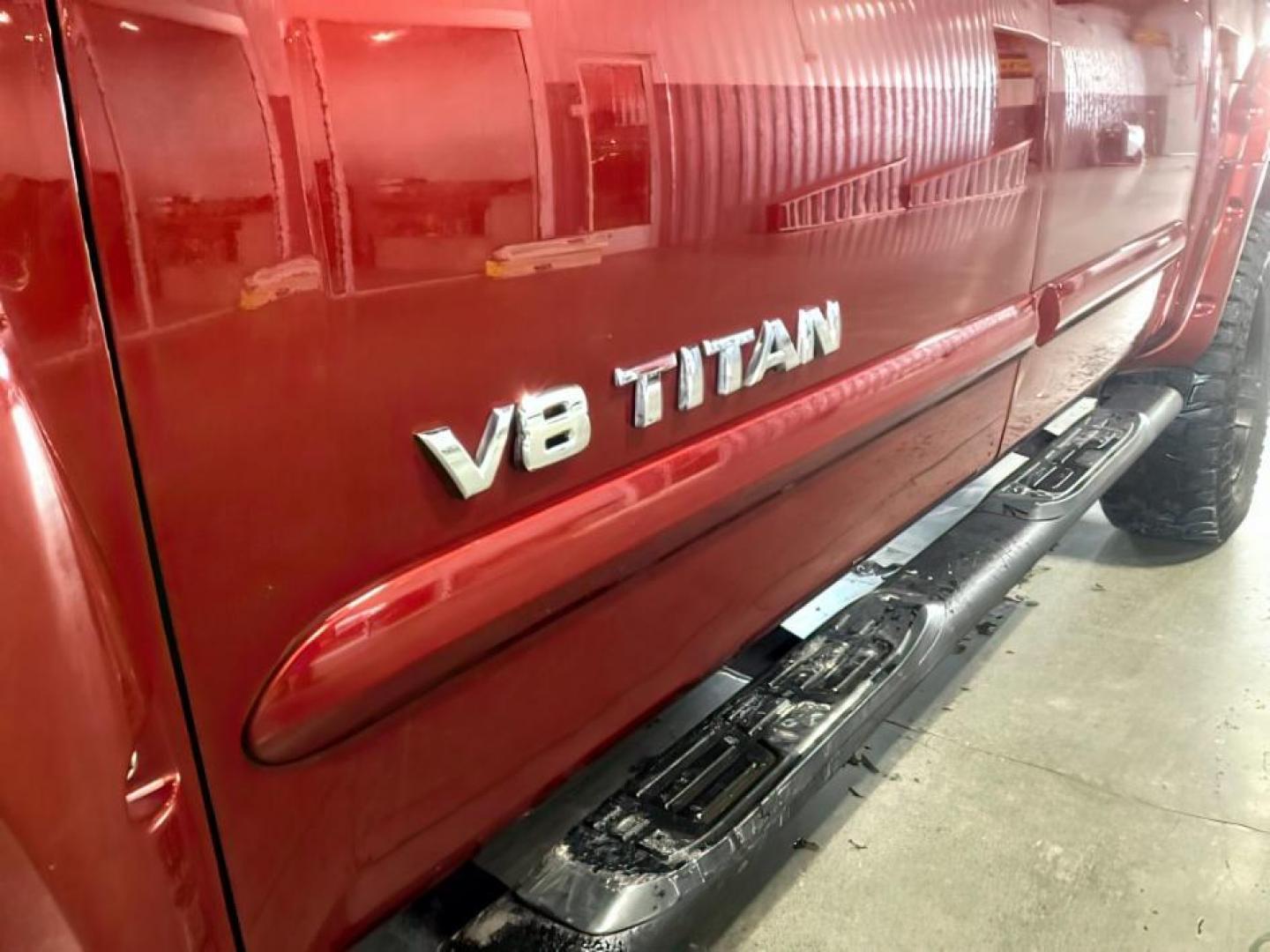 2014 Venetian Ruby /Charcoal II Nissan Titan PRO-4X Crew Cab 4WD SWB (1N6AA0ECXEN) with an 5.6L V8 DOHC 32V engine, 5-Speed Automatic transmission, located at 1235 N Woodruff Ave., Idaho Falls, 83401, (208) 523-1053, 43.507172, -112.000488 - At Timberline Auto, finding a great deal on your next vehicle is always easy! Our experienced sales staff's goal is to help find you the right vehicle at the right price! Our knowledgeable finance department has options for almost any credit score. We offer extended service contract options to prote - Photo#7