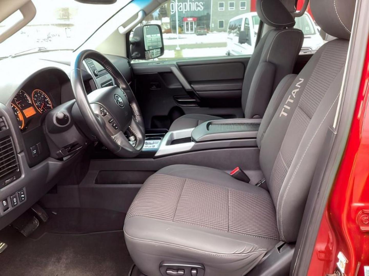 2014 Venetian Ruby /Charcoal II Nissan Titan PRO-4X Crew Cab 4WD SWB (1N6AA0ECXEN) with an 5.6L V8 DOHC 32V engine, 5-Speed Automatic transmission, located at 1235 N Woodruff Ave., Idaho Falls, 83401, (208) 523-1053, 43.507172, -112.000488 - At Timberline Auto, finding a great deal on your next vehicle is always easy! Our experienced sales staff's goal is to help find you the right vehicle at the right price! Our knowledgeable finance department has options for almost any credit score. We offer extended service contract options to prote - Photo#12