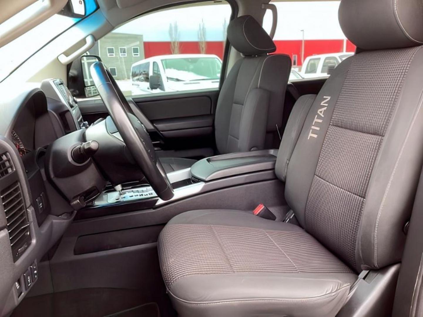 2014 Venetian Ruby /Charcoal II Nissan Titan PRO-4X Crew Cab 4WD SWB (1N6AA0ECXEN) with an 5.6L V8 DOHC 32V engine, 5-Speed Automatic transmission, located at 1235 N Woodruff Ave., Idaho Falls, 83401, (208) 523-1053, 43.507172, -112.000488 - At Timberline Auto, finding a great deal on your next vehicle is always easy! Our experienced sales staff's goal is to help find you the right vehicle at the right price! Our knowledgeable finance department has options for almost any credit score. We offer extended service contract options to prote - Photo#14