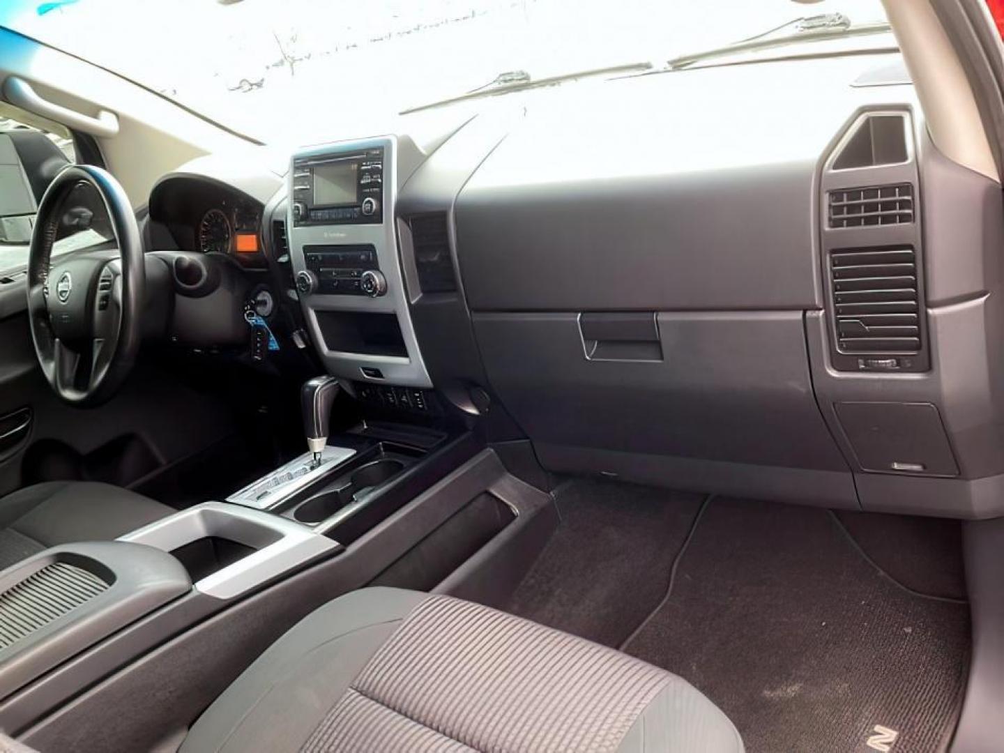 2014 Venetian Ruby /Charcoal II Nissan Titan PRO-4X Crew Cab 4WD SWB (1N6AA0ECXEN) with an 5.6L V8 DOHC 32V engine, 5-Speed Automatic transmission, located at 1235 N Woodruff Ave., Idaho Falls, 83401, (208) 523-1053, 43.507172, -112.000488 - At Timberline Auto, finding a great deal on your next vehicle is always easy! Our experienced sales staff's goal is to help find you the right vehicle at the right price! Our knowledgeable finance department has options for almost any credit score. We offer extended service contract options to prote - Photo#17