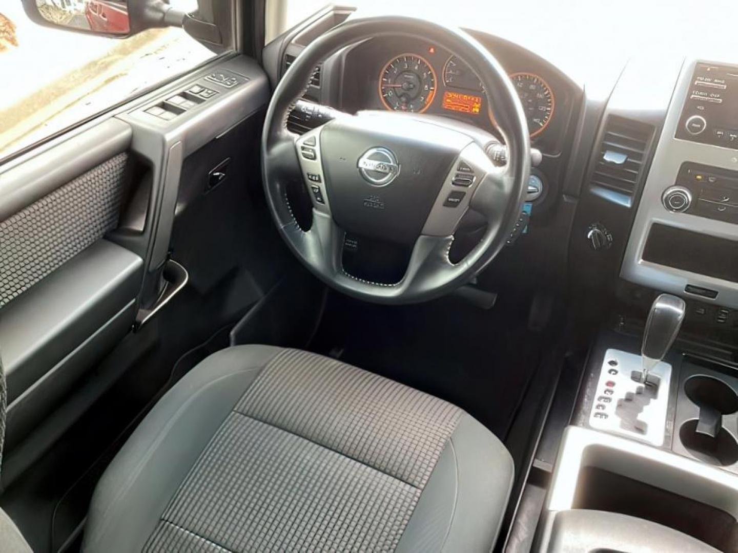 2014 Venetian Ruby /Charcoal II Nissan Titan PRO-4X Crew Cab 4WD SWB (1N6AA0ECXEN) with an 5.6L V8 DOHC 32V engine, 5-Speed Automatic transmission, located at 1235 N Woodruff Ave., Idaho Falls, 83401, (208) 523-1053, 43.507172, -112.000488 - At Timberline Auto, finding a great deal on your next vehicle is always easy! Our experienced sales staff's goal is to help find you the right vehicle at the right price! Our knowledgeable finance department has options for almost any credit score. We offer extended service contract options to prote - Photo#21