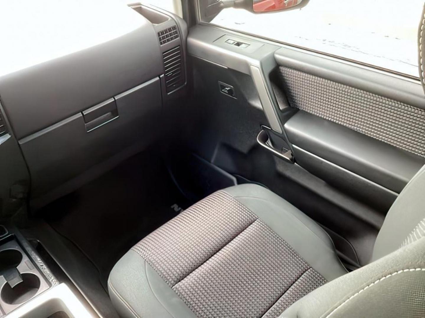 2014 Venetian Ruby /Charcoal II Nissan Titan PRO-4X Crew Cab 4WD SWB (1N6AA0ECXEN) with an 5.6L V8 DOHC 32V engine, 5-Speed Automatic transmission, located at 1235 N Woodruff Ave., Idaho Falls, 83401, (208) 523-1053, 43.507172, -112.000488 - At Timberline Auto, finding a great deal on your next vehicle is always easy! Our experienced sales staff's goal is to help find you the right vehicle at the right price! Our knowledgeable finance department has options for almost any credit score. We offer extended service contract options to prote - Photo#22