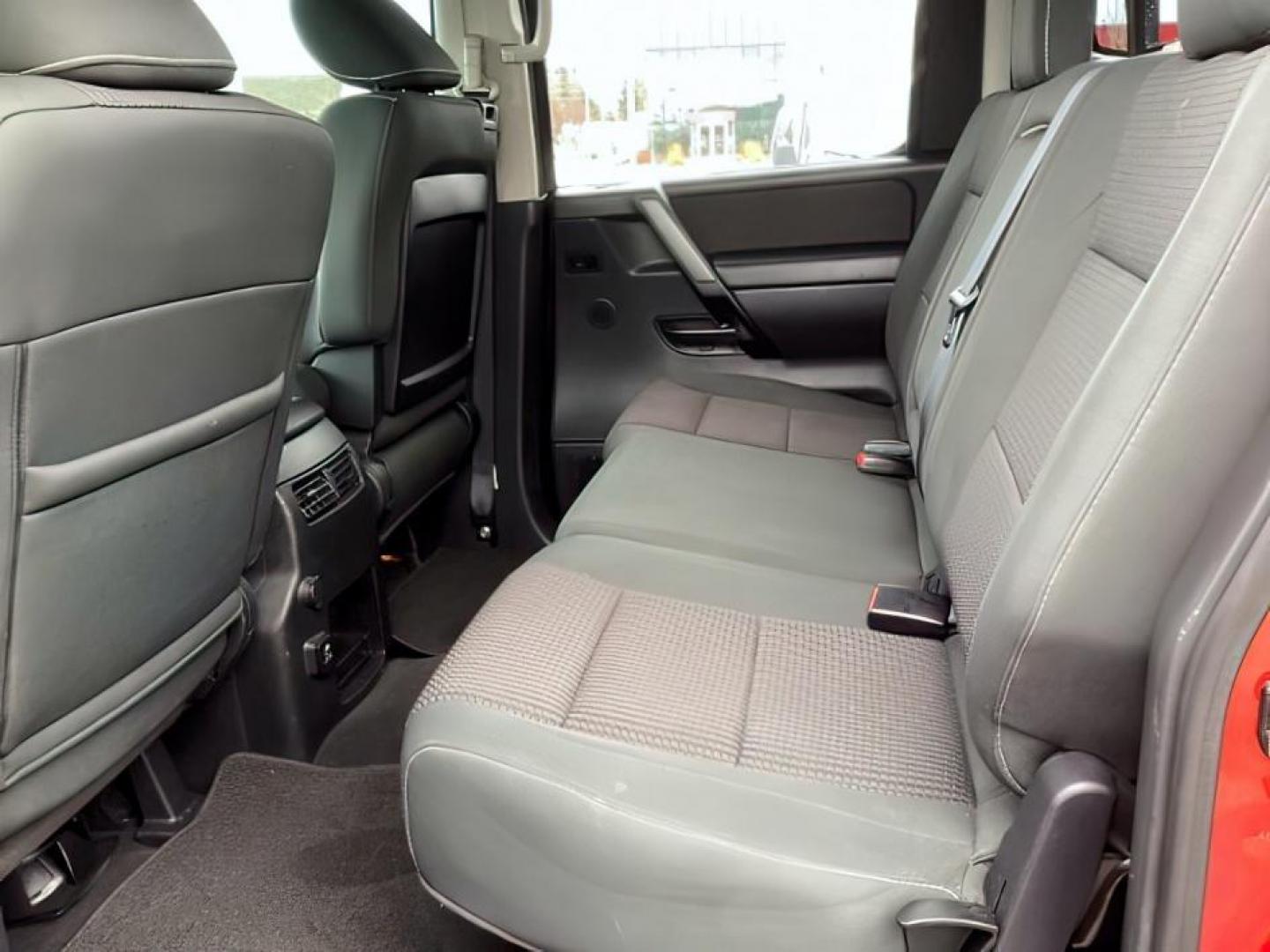 2014 Venetian Ruby /Charcoal II Nissan Titan PRO-4X Crew Cab 4WD SWB (1N6AA0ECXEN) with an 5.6L V8 DOHC 32V engine, 5-Speed Automatic transmission, located at 1235 N Woodruff Ave., Idaho Falls, 83401, (208) 523-1053, 43.507172, -112.000488 - At Timberline Auto, finding a great deal on your next vehicle is always easy! Our experienced sales staff's goal is to help find you the right vehicle at the right price! Our knowledgeable finance department has options for almost any credit score. We offer extended service contract options to prote - Photo#28