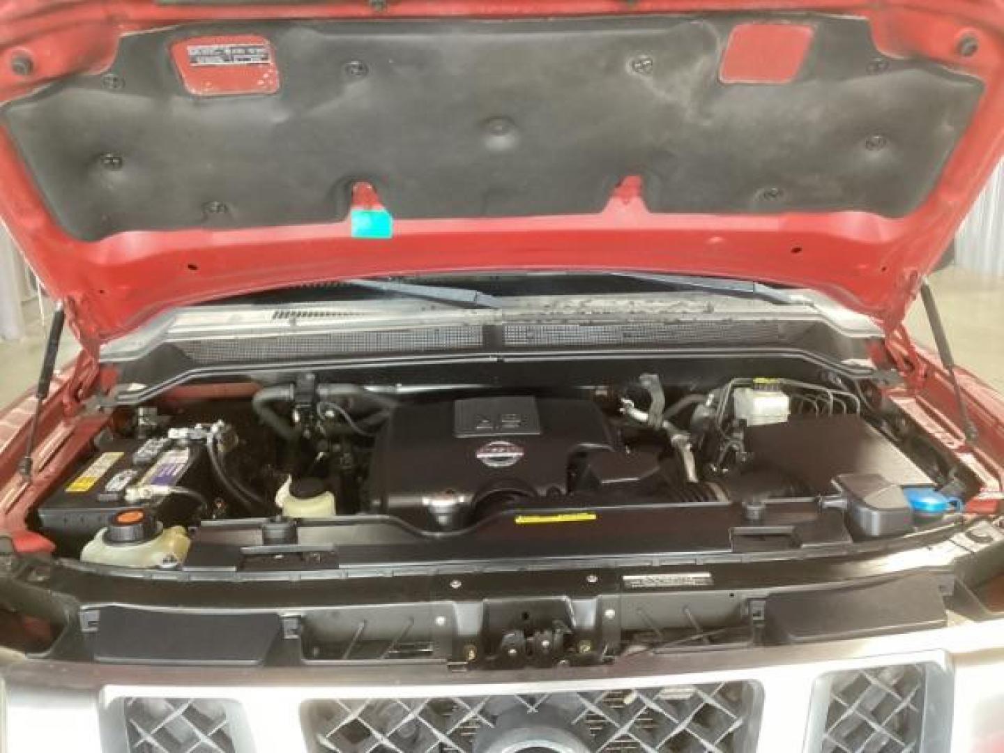 2014 Venetian Ruby /Charcoal II Nissan Titan PRO-4X Crew Cab 4WD SWB (1N6AA0ECXEN) with an 5.6L V8 DOHC 32V engine, 5-Speed Automatic transmission, located at 1235 N Woodruff Ave., Idaho Falls, 83401, (208) 523-1053, 43.507172, -112.000488 - At Timberline Auto, finding a great deal on your next vehicle is always easy! Our experienced sales staff's goal is to help find you the right vehicle at the right price! Our knowledgeable finance department has options for almost any credit score. We offer extended service contract options to prote - Photo#10