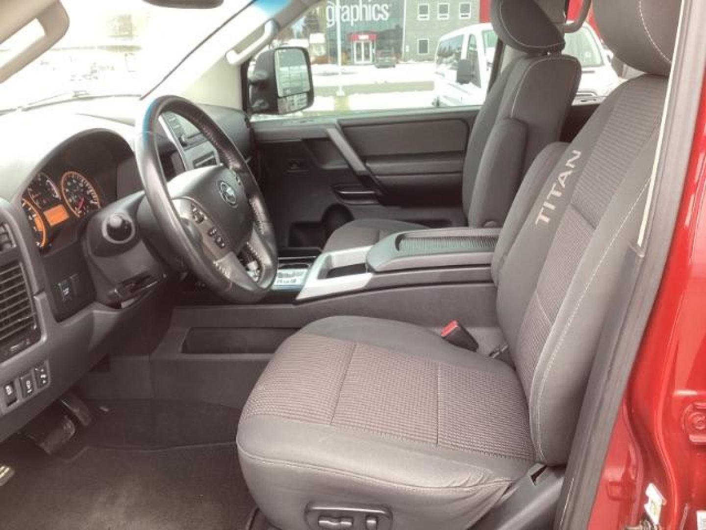2014 Venetian Ruby /Charcoal II Nissan Titan PRO-4X Crew Cab 4WD SWB (1N6AA0ECXEN) with an 5.6L V8 DOHC 32V engine, 5-Speed Automatic transmission, located at 1235 N Woodruff Ave., Idaho Falls, 83401, (208) 523-1053, 43.507172, -112.000488 - At Timberline Auto, finding a great deal on your next vehicle is always easy! Our experienced sales staff's goal is to help find you the right vehicle at the right price! Our knowledgeable finance department has options for almost any credit score. We offer extended service contract options to prote - Photo#12