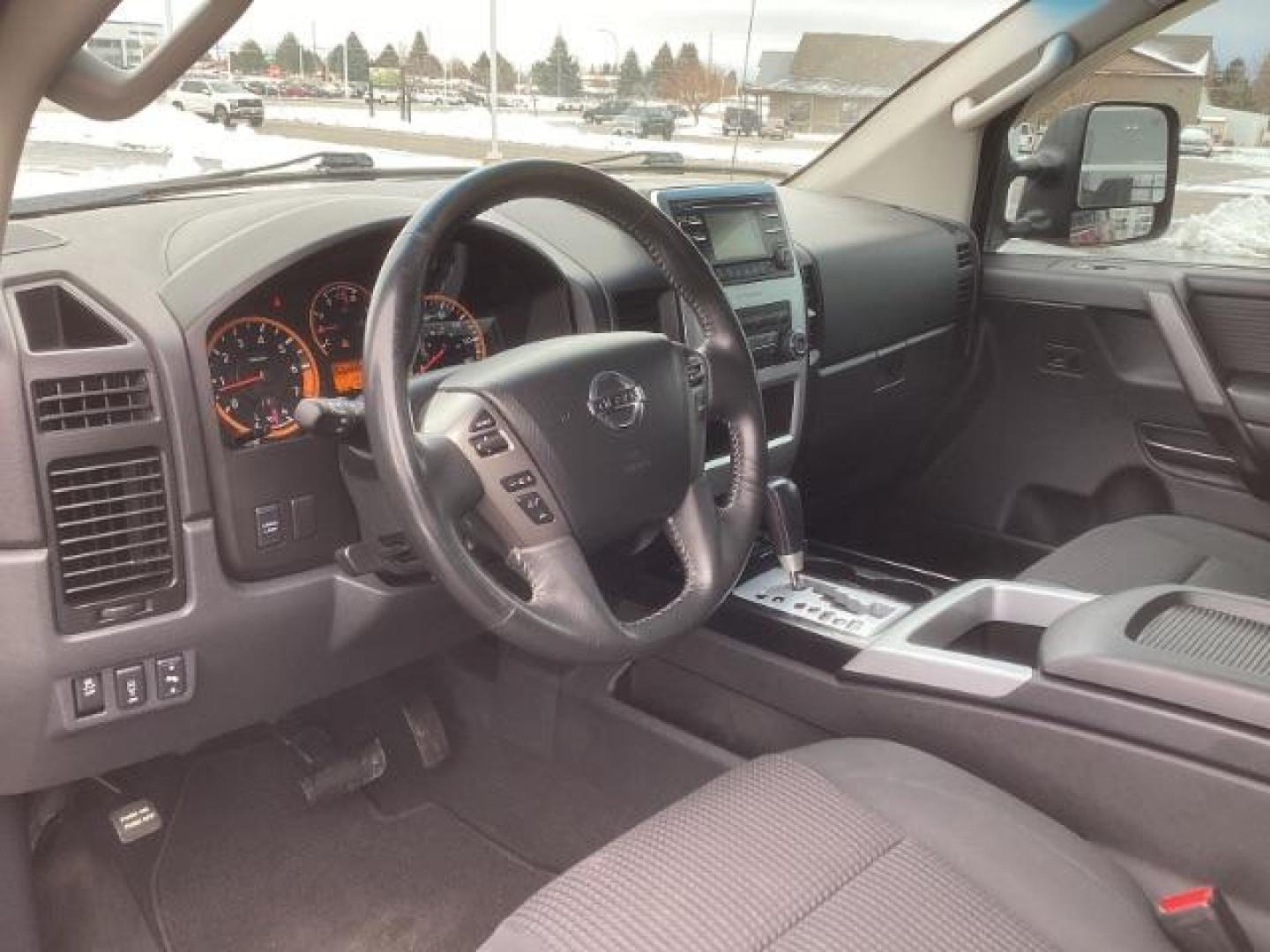 2014 Venetian Ruby /Charcoal II Nissan Titan PRO-4X Crew Cab 4WD SWB (1N6AA0ECXEN) with an 5.6L V8 DOHC 32V engine, 5-Speed Automatic transmission, located at 1235 N Woodruff Ave., Idaho Falls, 83401, (208) 523-1053, 43.507172, -112.000488 - At Timberline Auto, finding a great deal on your next vehicle is always easy! Our experienced sales staff's goal is to help find you the right vehicle at the right price! Our knowledgeable finance department has options for almost any credit score. We offer extended service contract options to prote - Photo#13
