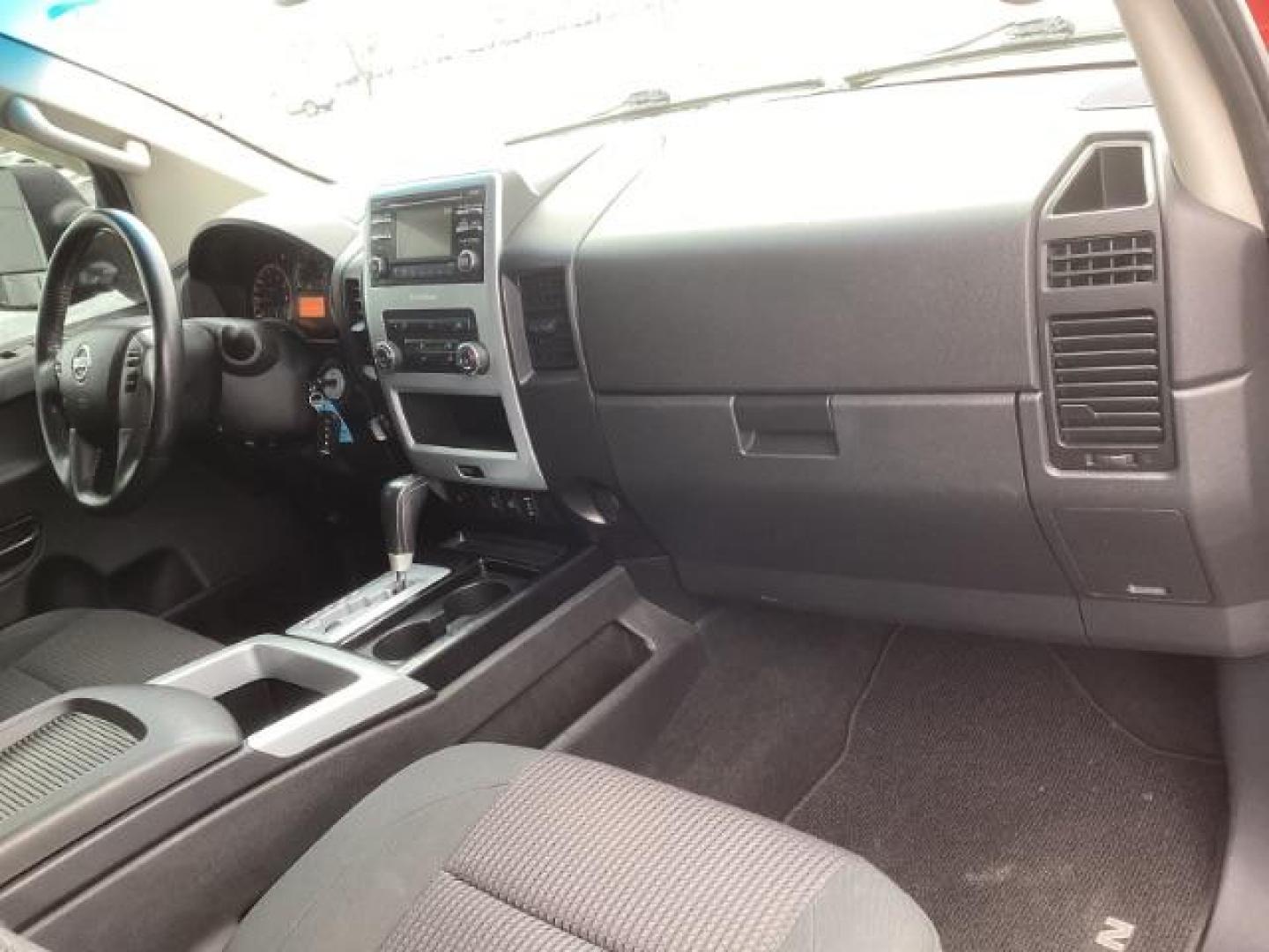 2014 Venetian Ruby /Charcoal II Nissan Titan PRO-4X Crew Cab 4WD SWB (1N6AA0ECXEN) with an 5.6L V8 DOHC 32V engine, 5-Speed Automatic transmission, located at 1235 N Woodruff Ave., Idaho Falls, 83401, (208) 523-1053, 43.507172, -112.000488 - At Timberline Auto, finding a great deal on your next vehicle is always easy! Our experienced sales staff's goal is to help find you the right vehicle at the right price! Our knowledgeable finance department has options for almost any credit score. We offer extended service contract options to prote - Photo#17