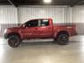2014 Venetian Ruby /Charcoal II Nissan Titan PRO-4X Crew Cab 4WD SWB (1N6AA0ECXEN) with an 5.6L V8 DOHC 32V engine, 5-Speed Automatic transmission, located at 1235 N Woodruff Ave., Idaho Falls, 83401, (208) 523-1053, 43.507172, -112.000488 - At Timberline Auto, finding a great deal on your next vehicle is always easy! Our experienced sales staff's goal is to help find you the right vehicle at the right price! Our knowledgeable finance department has options for almost any credit score. We offer extended service contract options to prote - Photo#1