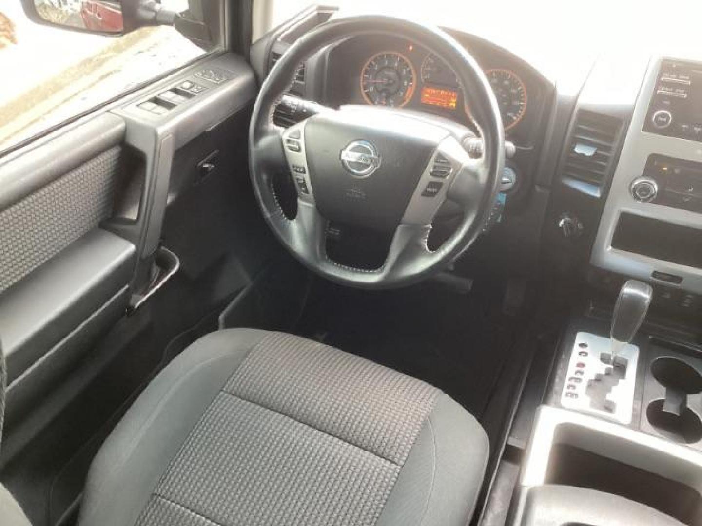 2014 Venetian Ruby /Charcoal II Nissan Titan PRO-4X Crew Cab 4WD SWB (1N6AA0ECXEN) with an 5.6L V8 DOHC 32V engine, 5-Speed Automatic transmission, located at 1235 N Woodruff Ave., Idaho Falls, 83401, (208) 523-1053, 43.507172, -112.000488 - At Timberline Auto, finding a great deal on your next vehicle is always easy! Our experienced sales staff's goal is to help find you the right vehicle at the right price! Our knowledgeable finance department has options for almost any credit score. We offer extended service contract options to prote - Photo#21
