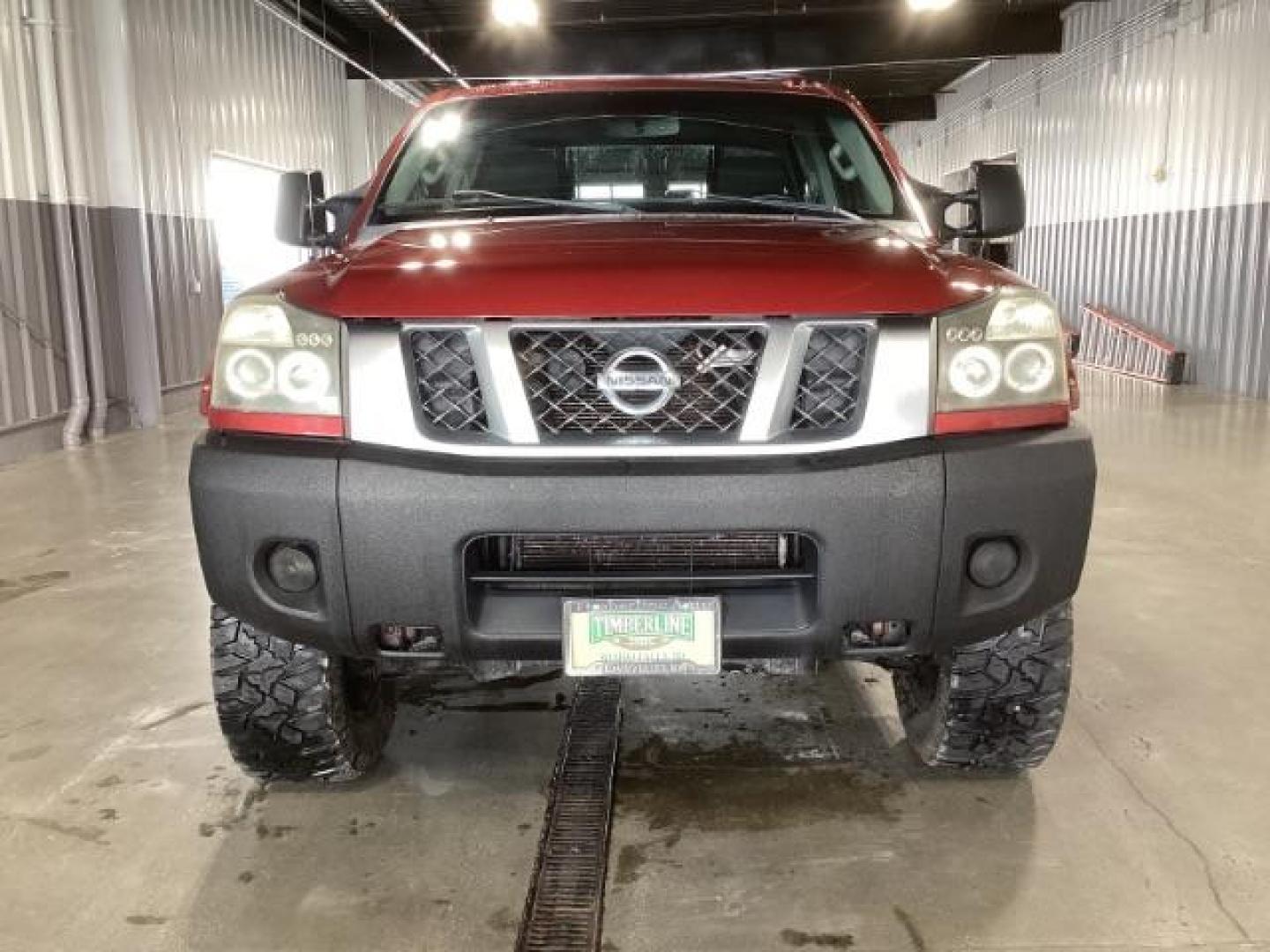 2014 Venetian Ruby /Charcoal II Nissan Titan PRO-4X Crew Cab 4WD SWB (1N6AA0ECXEN) with an 5.6L V8 DOHC 32V engine, 5-Speed Automatic transmission, located at 1235 N Woodruff Ave., Idaho Falls, 83401, (208) 523-1053, 43.507172, -112.000488 - At Timberline Auto, finding a great deal on your next vehicle is always easy! Our experienced sales staff's goal is to help find you the right vehicle at the right price! Our knowledgeable finance department has options for almost any credit score. We offer extended service contract options to prote - Photo#6