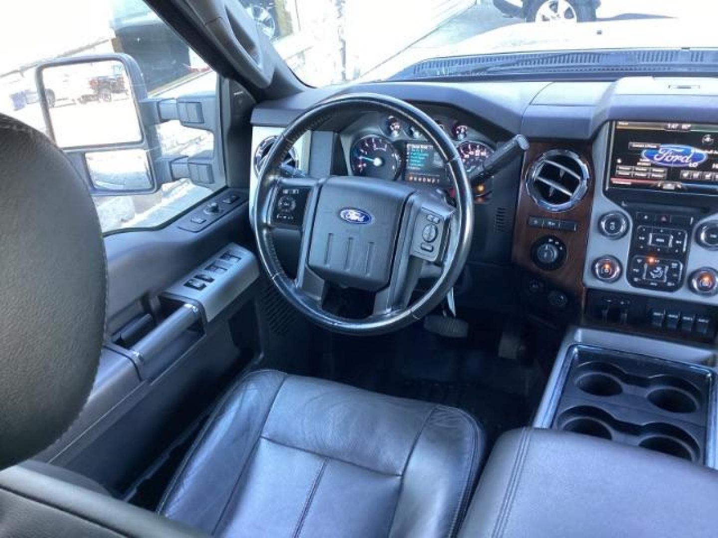 2015 Blue Jeans Metallic /Black Ford F-350 SD Lariat Crew Cab 4WD (1FT8W3BT4FE) with an 6.7L V8 OHV 16V DIESEL engine, 6-Speed Automatic transmission, located at 1235 N Woodruff Ave., Idaho Falls, 83401, (208) 523-1053, 43.507172, -112.000488 - Photo#21