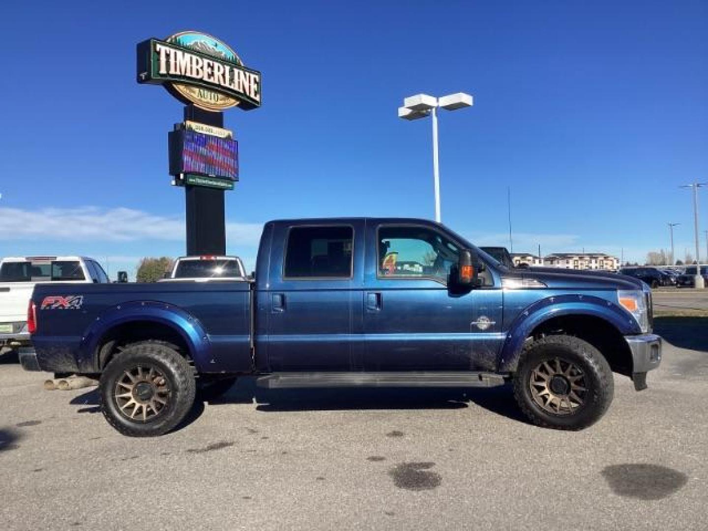 2015 Blue Jeans Metallic /Black Ford F-350 SD Lariat Crew Cab 4WD (1FT8W3BT4FE) with an 6.7L V8 OHV 16V DIESEL engine, 6-Speed Automatic transmission, located at 1235 N Woodruff Ave., Idaho Falls, 83401, (208) 523-1053, 43.507172, -112.000488 - Photo#6