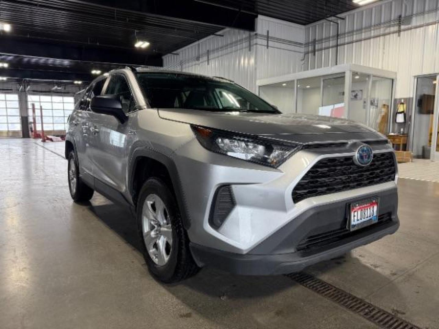 2021 Silver Sky Metallic /Black, cloth Toyota RAV4 Hybrid LE (4T3L6RFVXMU) with an 2.5L L4 DOHC 16V HYBRID engine, Continuously Variable Transmission transmission, located at 1235 N Woodruff Ave., Idaho Falls, 83401, (208) 523-1053, 43.507172, -112.000488 - At Timberline Auto, finding a great deal on your next vehicle is always easy! Our experienced sales staff's goal is to help find you the right vehicle at the right price! Our knowledgeable finance department has options for almost any credit score. We offer extended service contract options to prote - Photo#0