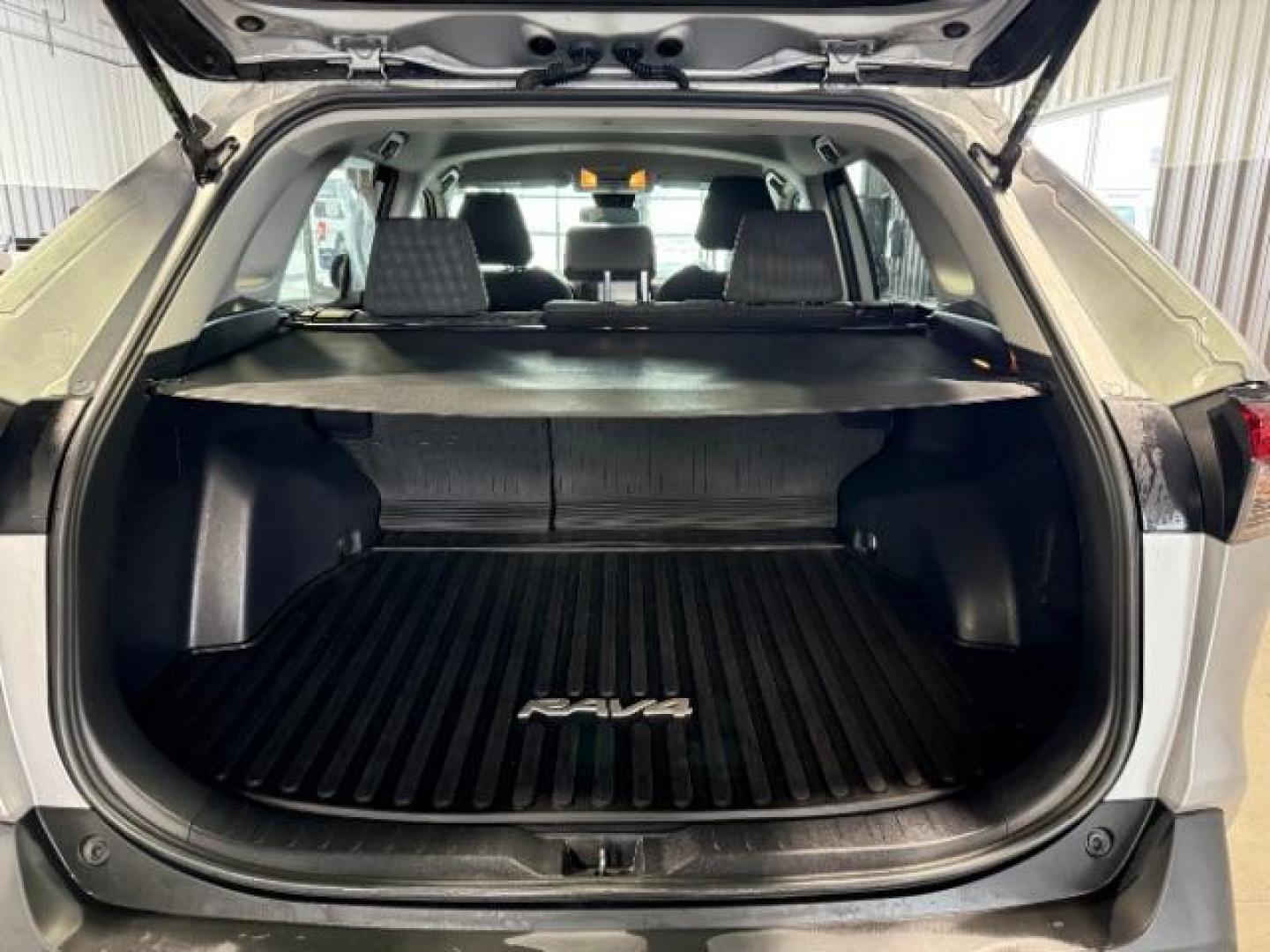 2021 Silver Sky Metallic /Black, cloth Toyota RAV4 Hybrid LE (4T3L6RFVXMU) with an 2.5L L4 DOHC 16V HYBRID engine, Continuously Variable Transmission transmission, located at 1235 N Woodruff Ave., Idaho Falls, 83401, (208) 523-1053, 43.507172, -112.000488 - At Timberline Auto, finding a great deal on your next vehicle is always easy! Our experienced sales staff's goal is to help find you the right vehicle at the right price! Our knowledgeable finance department has options for almost any credit score. We offer extended service contract options to prote - Photo#10