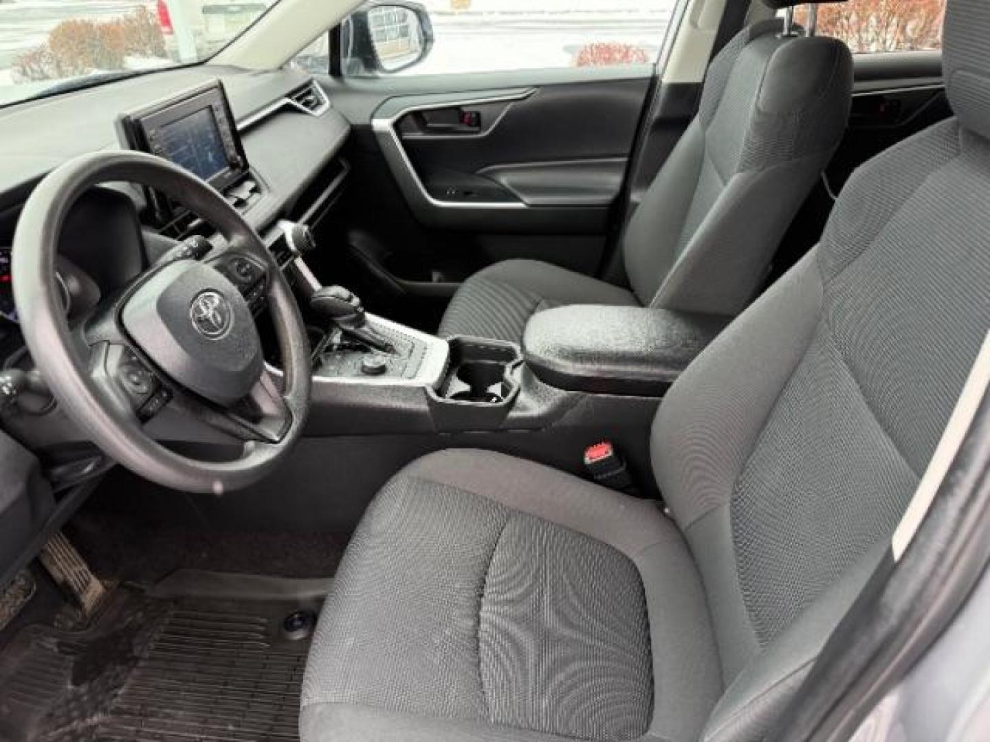 2021 Silver Sky Metallic /Black, cloth Toyota RAV4 Hybrid LE (4T3L6RFVXMU) with an 2.5L L4 DOHC 16V HYBRID engine, Continuously Variable Transmission transmission, located at 1235 N Woodruff Ave., Idaho Falls, 83401, (208) 523-1053, 43.507172, -112.000488 - At Timberline Auto, finding a great deal on your next vehicle is always easy! Our experienced sales staff's goal is to help find you the right vehicle at the right price! Our knowledgeable finance department has options for almost any credit score. We offer extended service contract options to prote - Photo#11