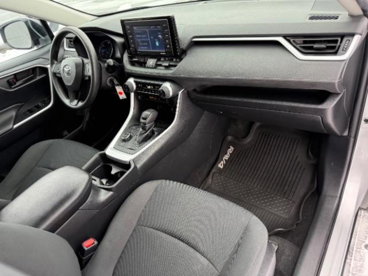 2021 Silver Sky Metallic /Black, cloth Toyota RAV4 Hybrid LE (4T3L6RFVXMU) with an 2.5L L4 DOHC 16V HYBRID engine, Continuously Variable Transmission transmission, located at 1235 N Woodruff Ave., Idaho Falls, 83401, (208) 523-1053, 43.507172, -112.000488 - At Timberline Auto, finding a great deal on your next vehicle is always easy! Our experienced sales staff's goal is to help find you the right vehicle at the right price! Our knowledgeable finance department has options for almost any credit score. We offer extended service contract options to prote - Photo#15