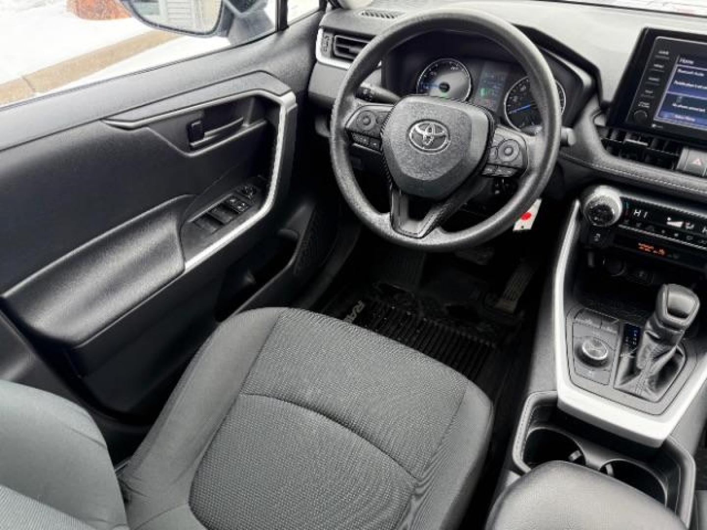 2021 Silver Sky Metallic /Black, cloth Toyota RAV4 Hybrid LE (4T3L6RFVXMU) with an 2.5L L4 DOHC 16V HYBRID engine, Continuously Variable Transmission transmission, located at 1235 N Woodruff Ave., Idaho Falls, 83401, (208) 523-1053, 43.507172, -112.000488 - At Timberline Auto, finding a great deal on your next vehicle is always easy! Our experienced sales staff's goal is to help find you the right vehicle at the right price! Our knowledgeable finance department has options for almost any credit score. We offer extended service contract options to prote - Photo#19