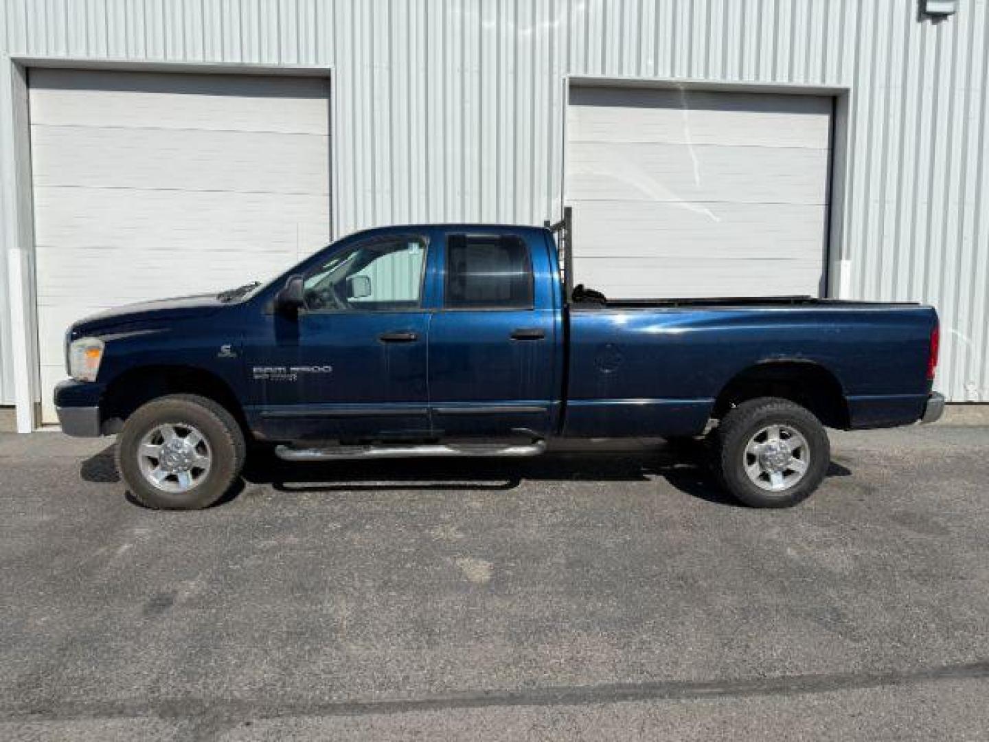 2006 BLUE /Medium Slate Gray Cloth Interior Dodge Ram 3500 SLT Quad Cab Long Bed 4WD (3D7LX38C96G) with an 5.9L L6 OHV 24V TURBO DIESEL engine, 6-Speed Manual transmission, located at 1235 N Woodruff Ave., Idaho Falls, 83401, (208) 523-1053, 43.507172, -112.000488 - At Timberline Auto, finding a great deal on your next vehicle is always easy! Our experienced sales staff's goal is to help find you the right vehicle at the right price! Our knowledgeable finance department has options for almost any credit score. We offer extended service contract options to prote - Photo#0