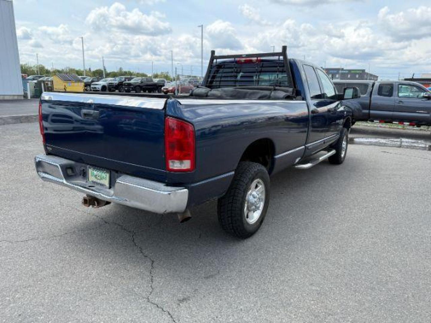 2006 BLUE /Medium Slate Gray Cloth Interior Dodge Ram 3500 SLT Quad Cab Long Bed 4WD (3D7LX38C96G) with an 5.9L L6 OHV 24V TURBO DIESEL engine, 6-Speed Manual transmission, located at 1235 N Woodruff Ave., Idaho Falls, 83401, (208) 523-1053, 43.507172, -112.000488 - At Timberline Auto, finding a great deal on your next vehicle is always easy! Our experienced sales staff's goal is to help find you the right vehicle at the right price! Our knowledgeable finance department has options for almost any credit score. We offer extended service contract options to prote - Photo#5